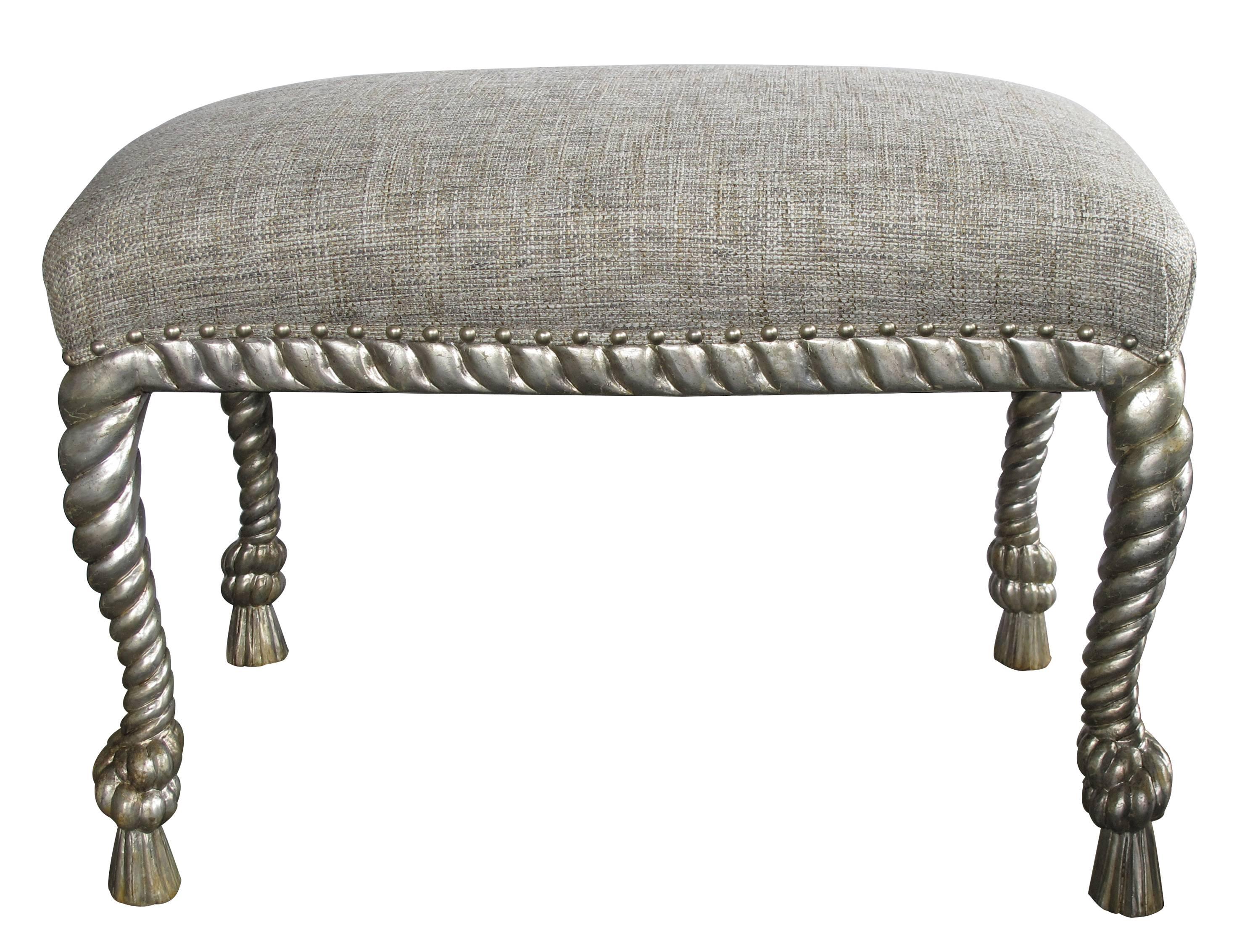 A stylish pair of American mid-century Dorothy Draper style silver-gilt rope-twist stools; each serpentine upholstered seat above a rope-twist carved apron raised on similarly carved cabriole legs