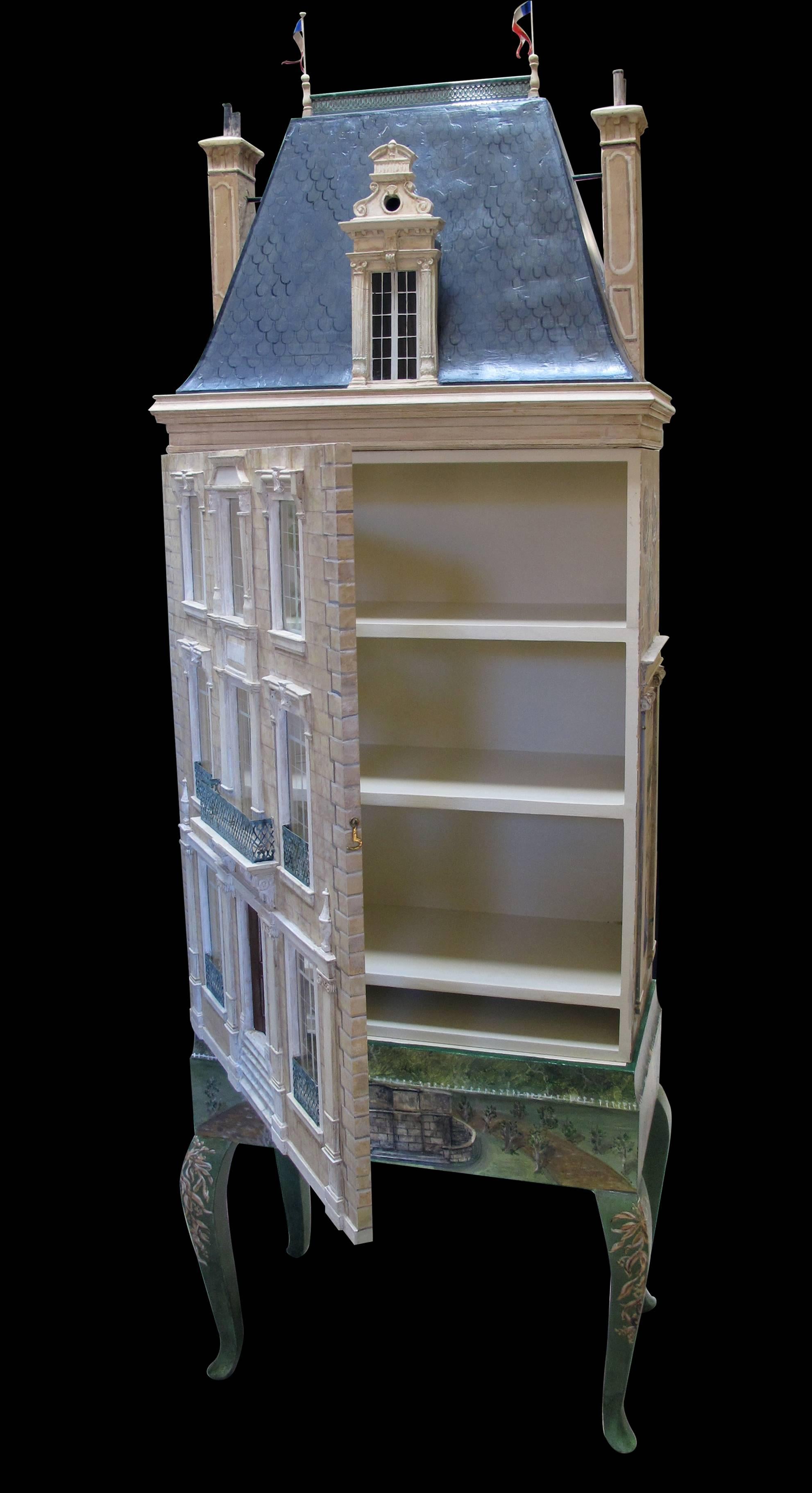 A rare and masterfully crafted wooden hand-painted dollhouse/cabinet of a stately French chateau by famed artisans Eric and Carole Lansdown; the most popular of Eric Lansdown dollhouse designs and the last of its series 'Carole and Eric Lansdown