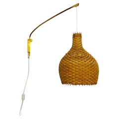 Adjustable Brass and Wicker Arc Sconce