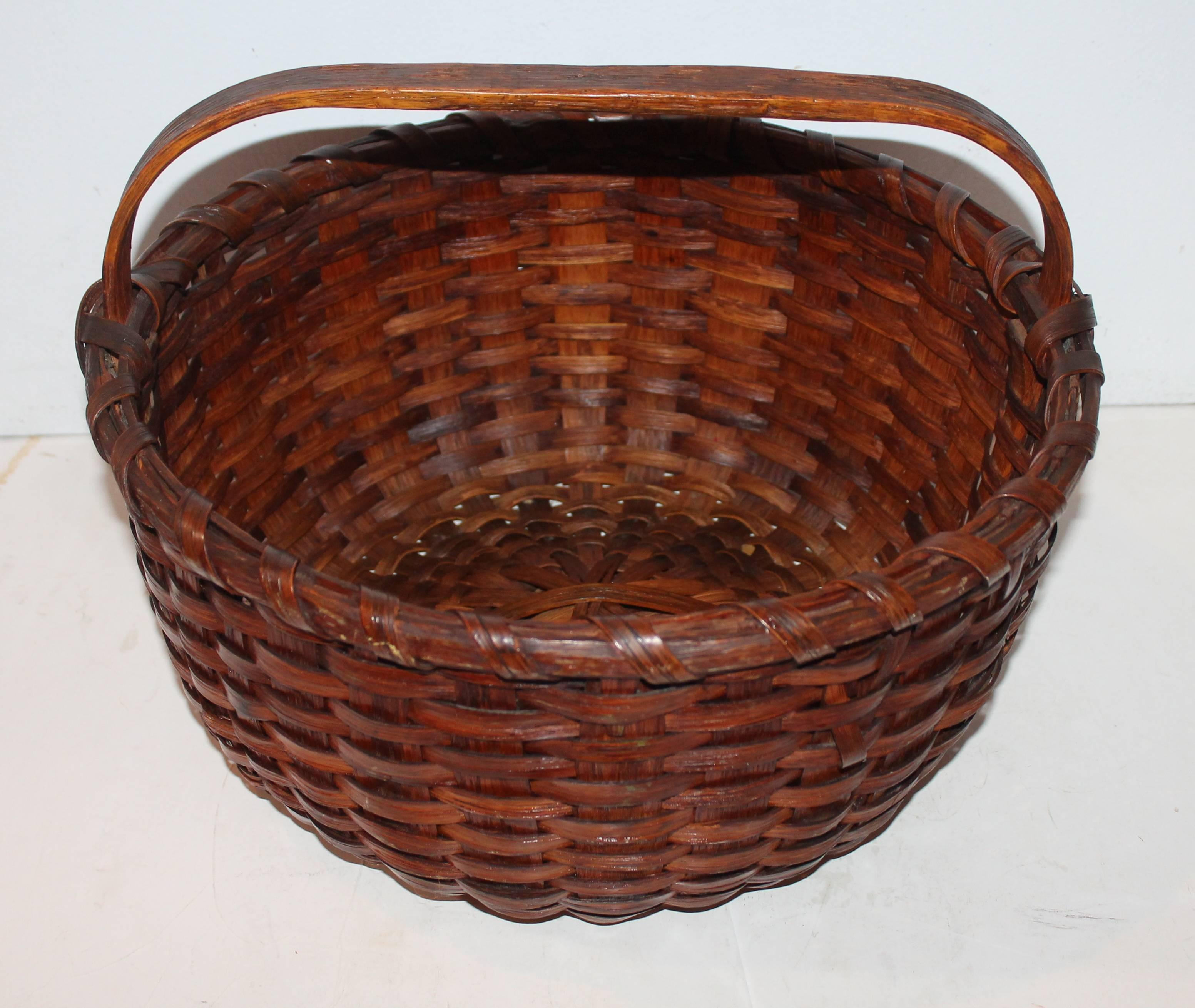 Large 19th century round fruit basket from Pennsylvania. This double wrap basket is in very good condition. Theses baskets are very hard to find in great condition.