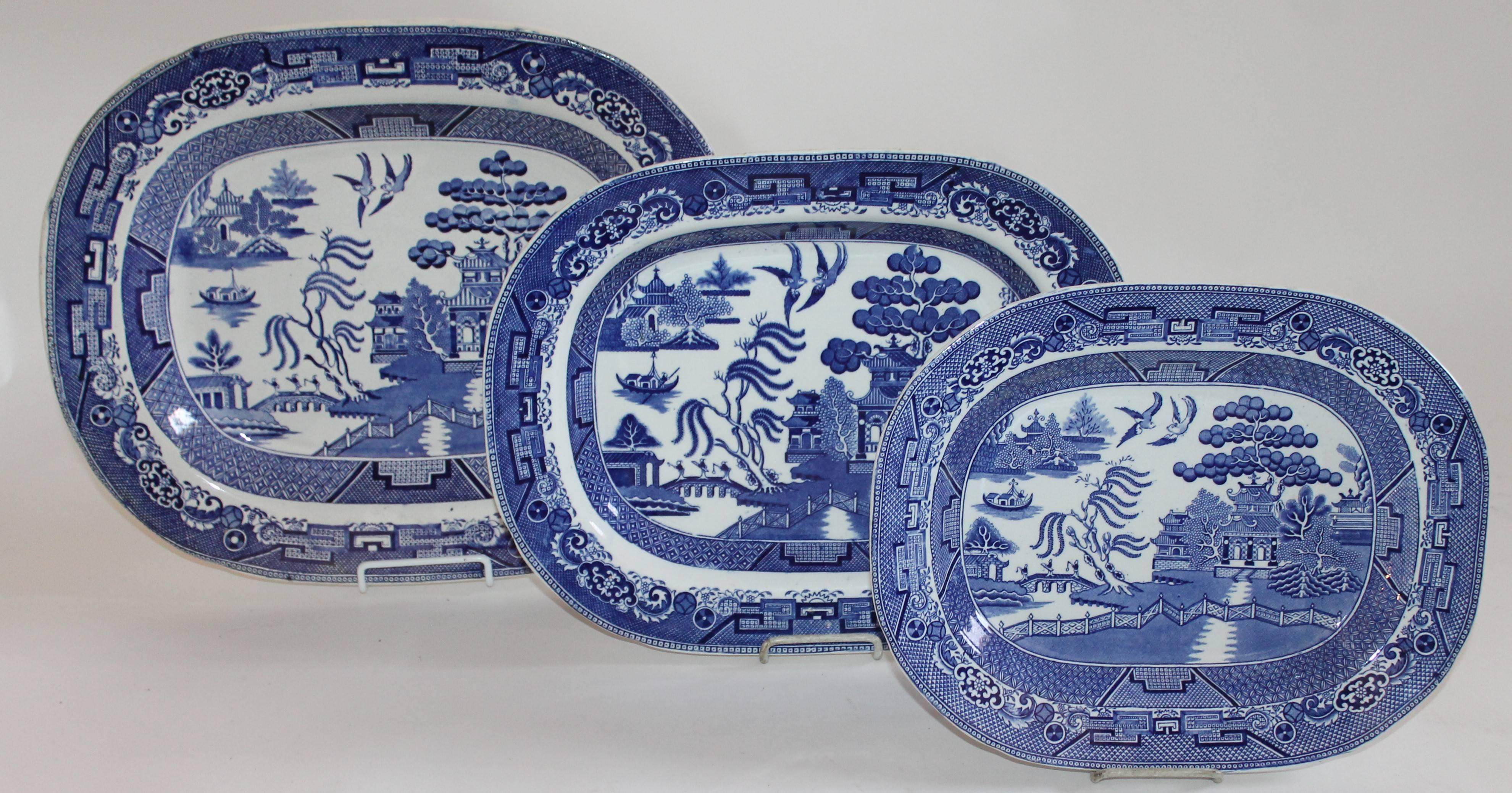 19th century English blue and white ironstone serving platter. This Fine example of early blue willow is great as a serving platter or great hanging on the wall. The condition is very good with minor crazing. No cracks or