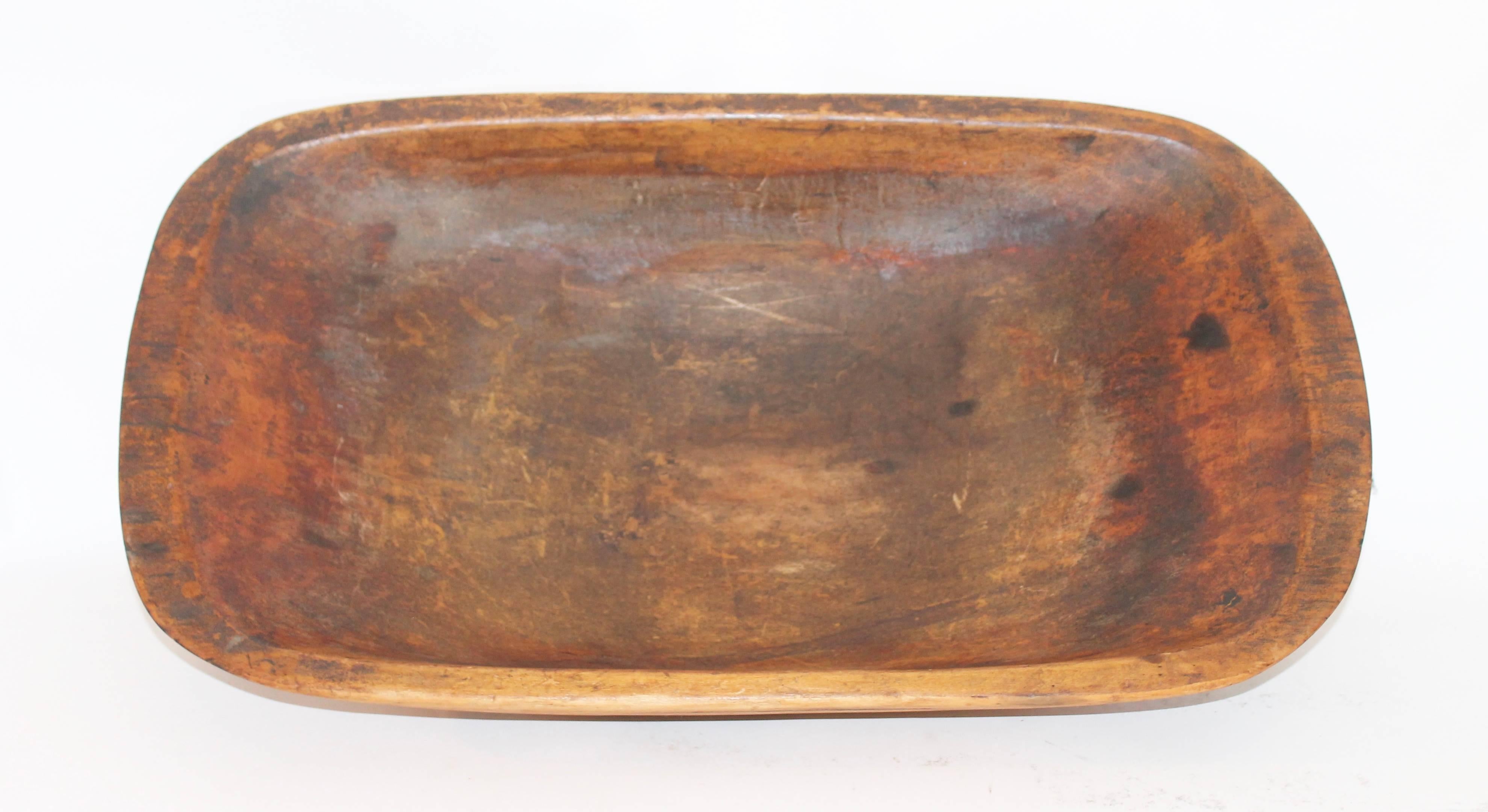 This fine shaped old natural surface dough bowl is in good condition with a natural worn patina. There are no breaks or cracks. Great for serving bowl.