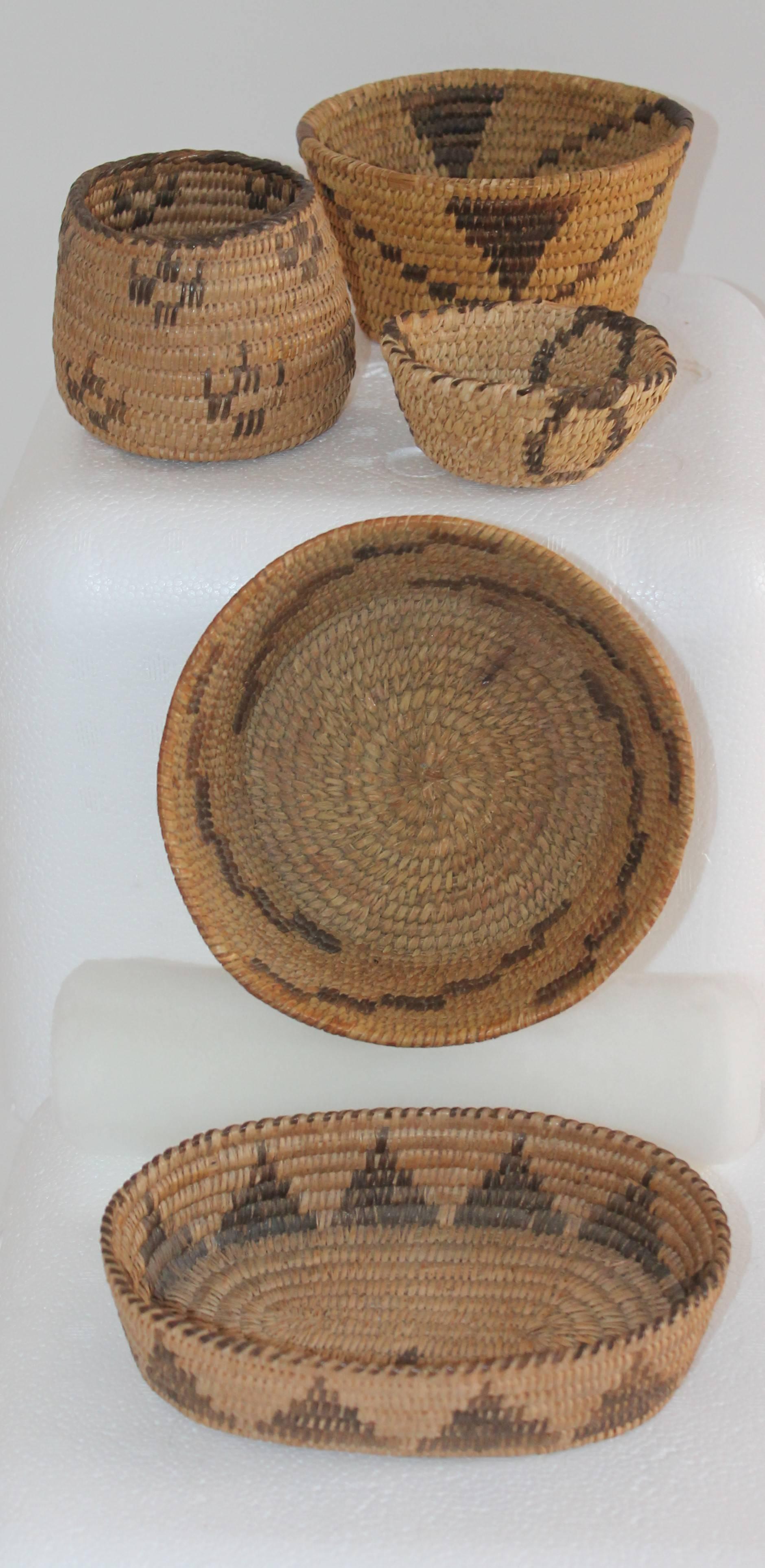 This fine collection of five amazing miniature Indian baskets are in great condition and quite hard to find. Various sizes from 4-6 inches in width.