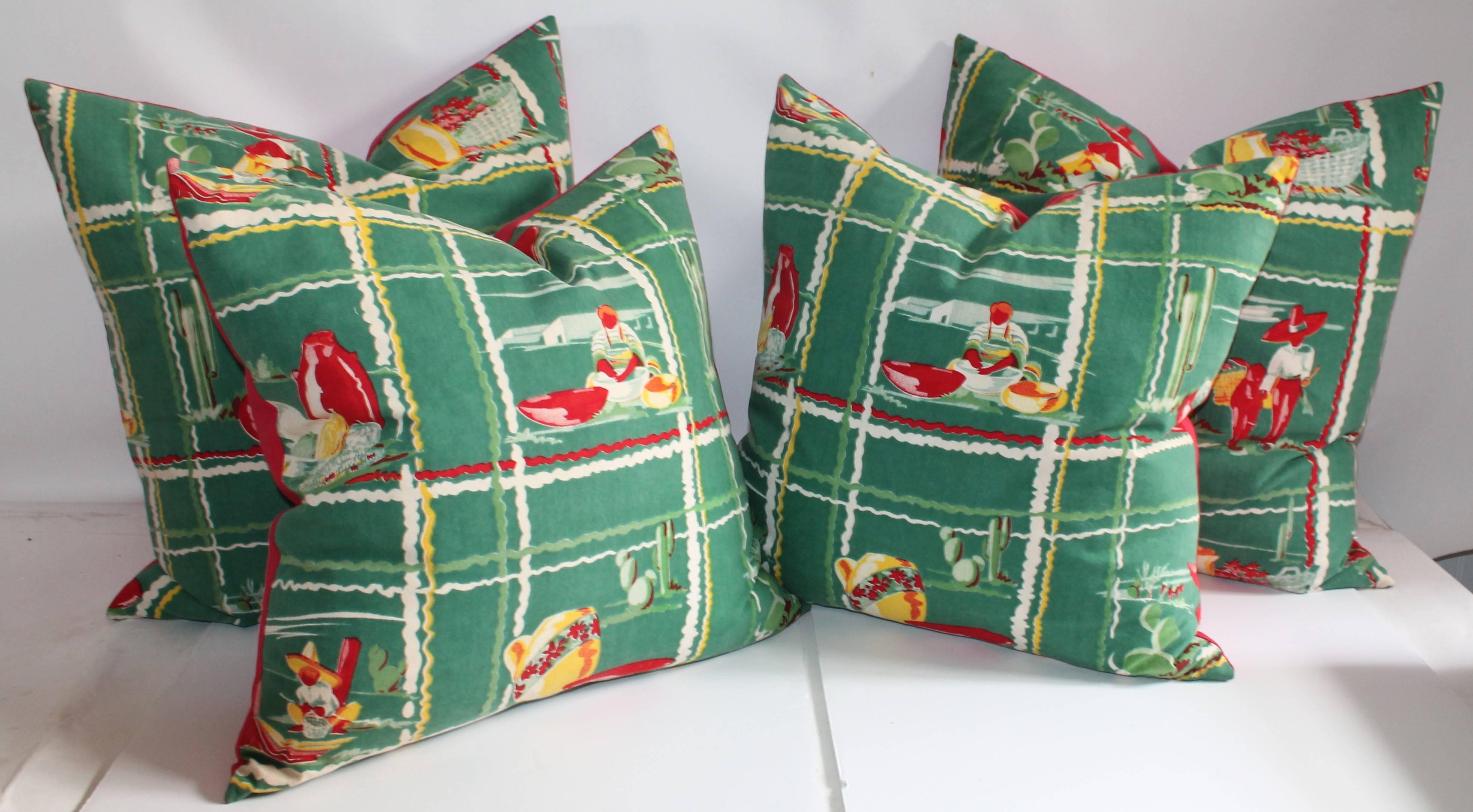 These fantastic Mexican scenic table cloth pillows are in great condition and all have cotton linen backings. The inserts are down and feather fill. Sold as a group of four pillows.