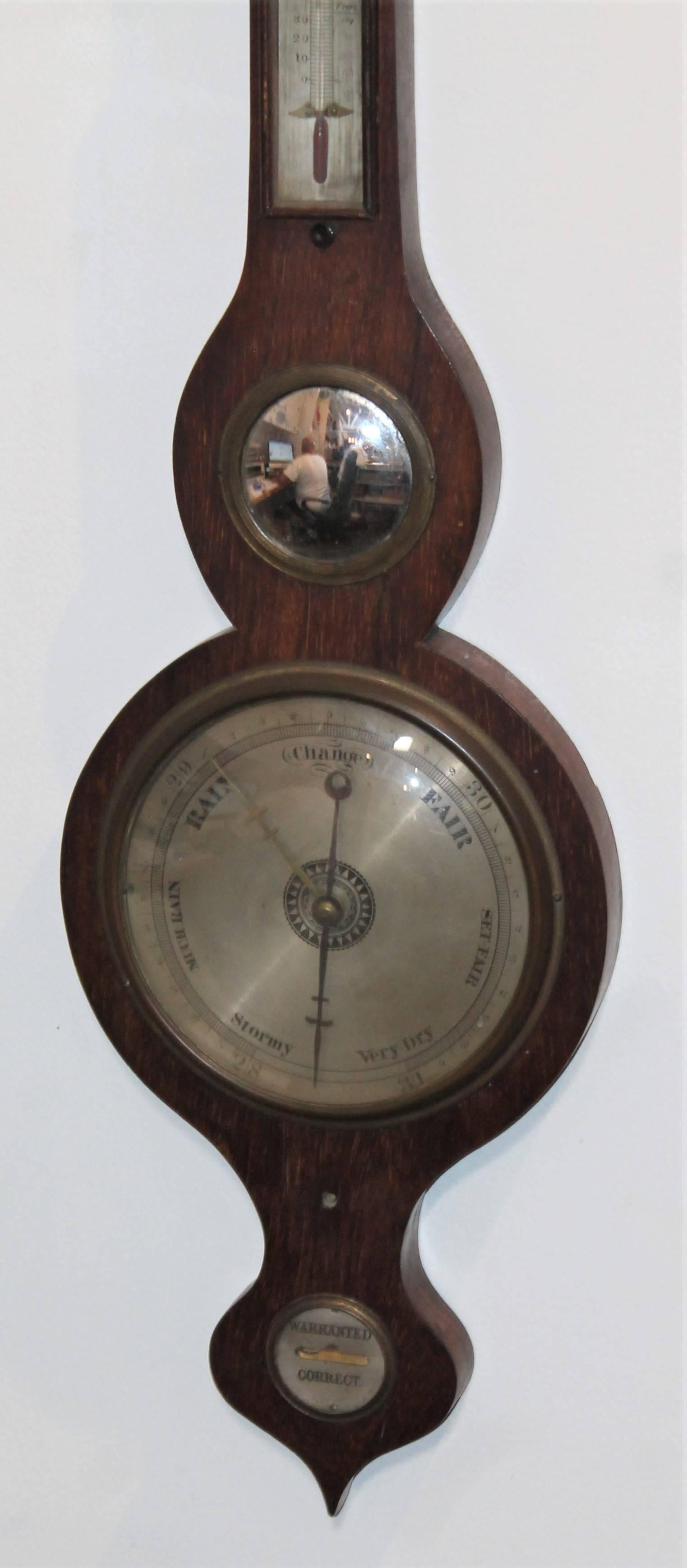 Wheel or banjo barometer. Original mercury glass mirror. All original, small glass shell is missing from the top.