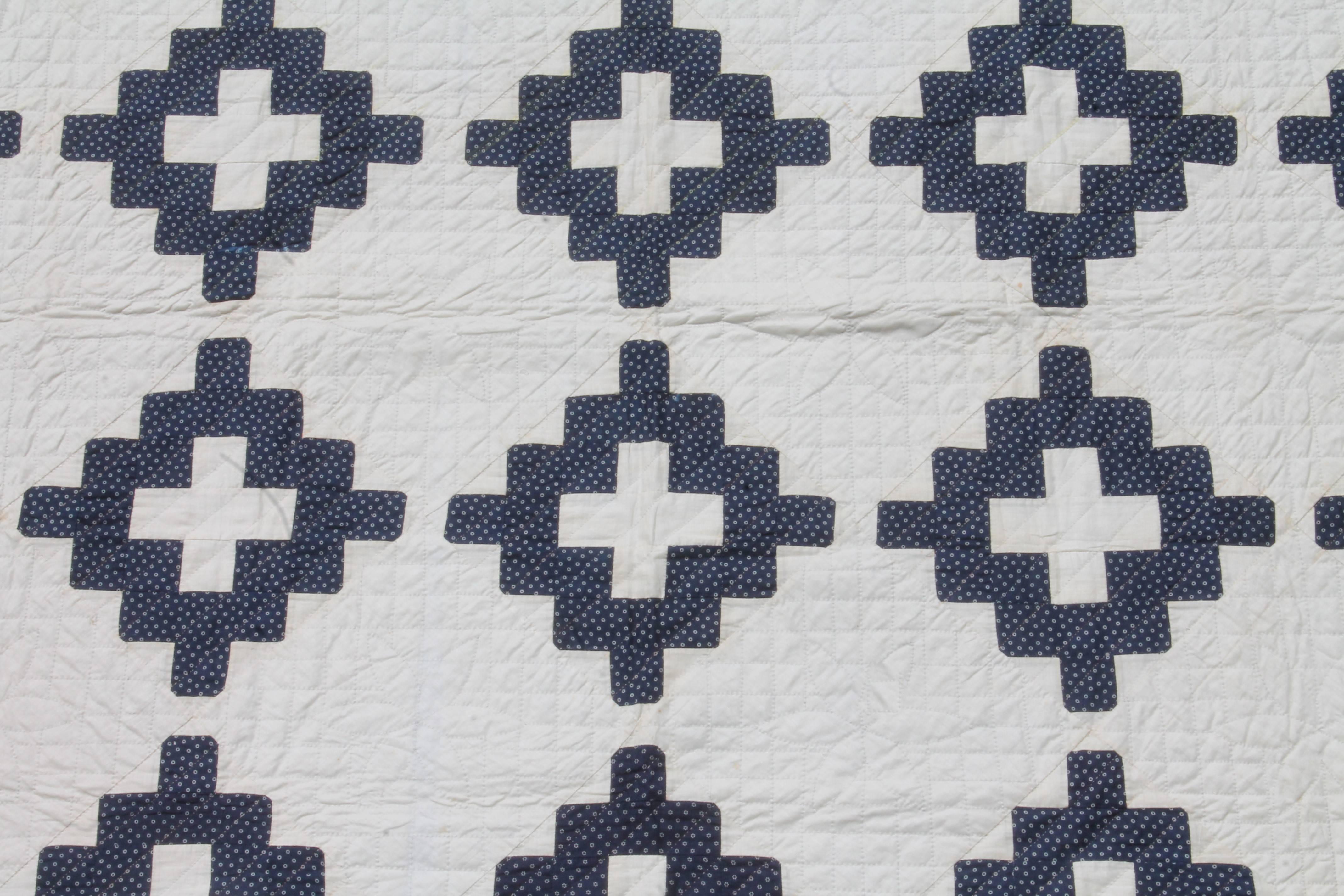 This fine 19th century indigo and white quilt from a estate in Ohio is in pristine condition and has tight quilting. The quilt is a good double bed size.