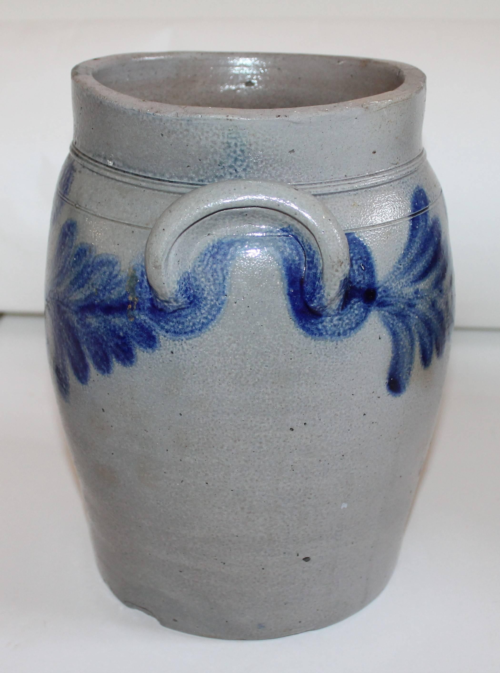 This fine decorated blue salt glaze two gallon and double handled crock is in great condition with minor small nicks in the glaze. The rich indigo blue glaze is super rich 
fantastic! Great for fresh flowers.