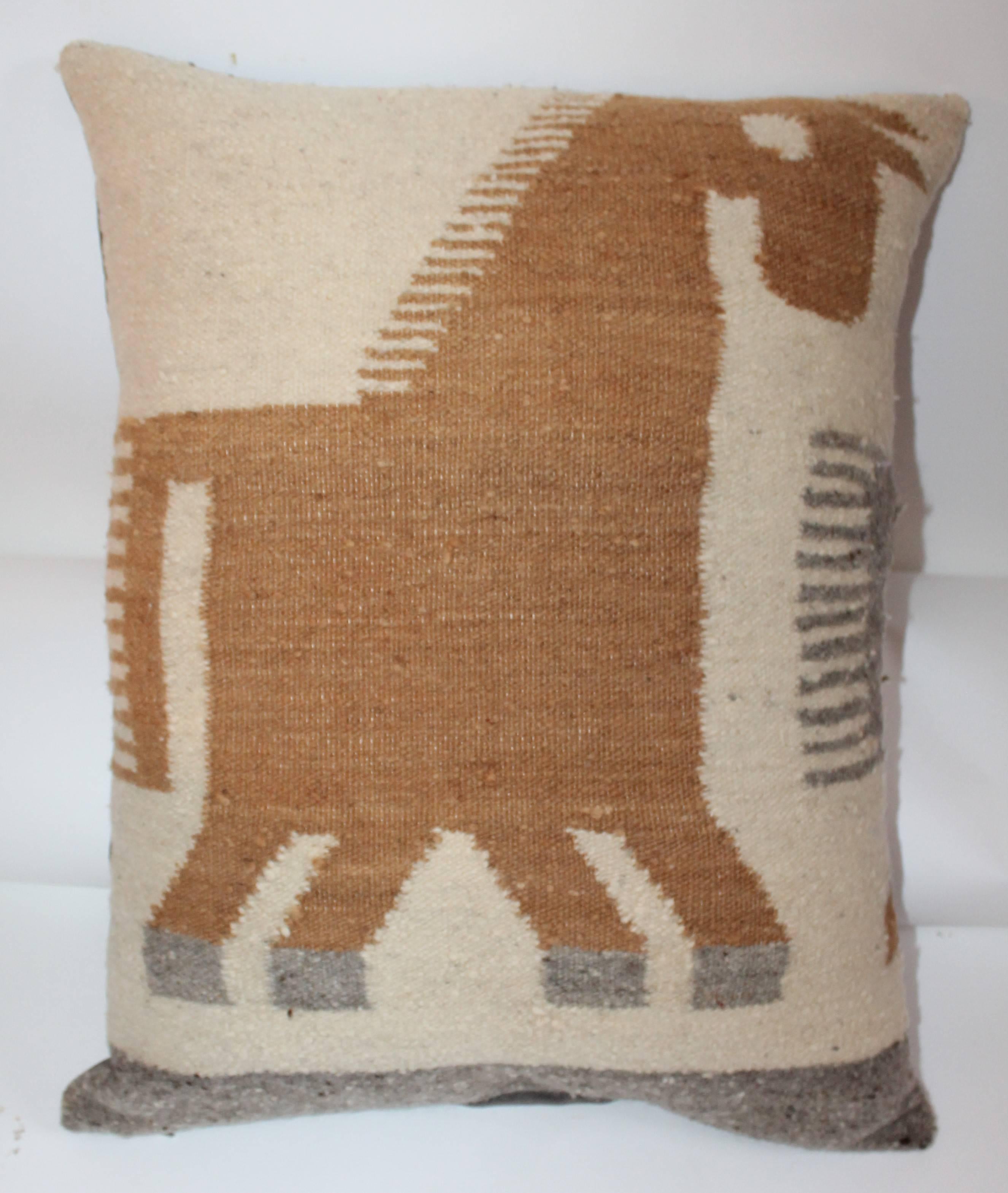 This folky handwoven Peruvian Indian weaving is in great condition and has a taupe cotton linen backing.