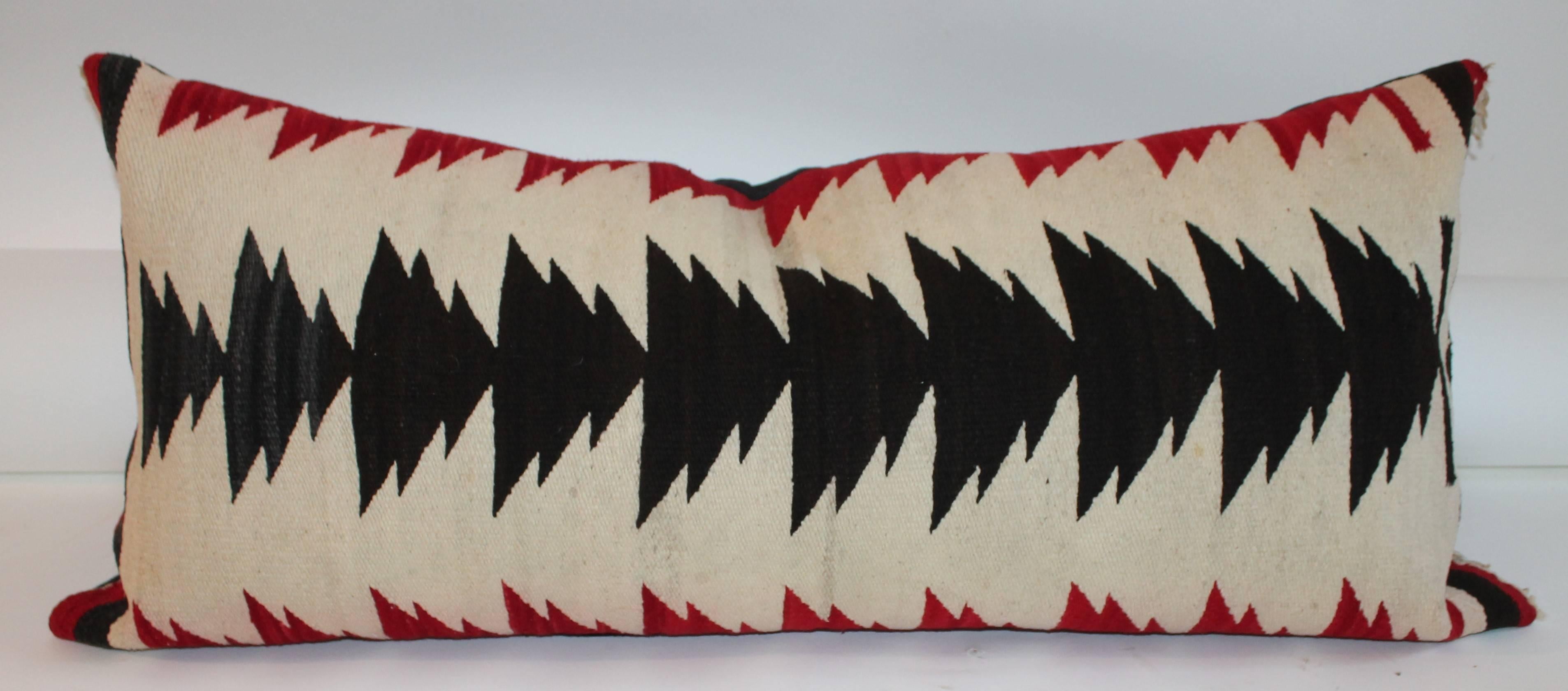 This group or collection of Navajo Saddle blanket weaving's bolster pillows. They are all in vibrant black and red with cream colors. The condition are very good. Bolster sizes are as follows : #1 18 x 35 #2 19 x 40 #3 20 x 40 #4 18 x 32.