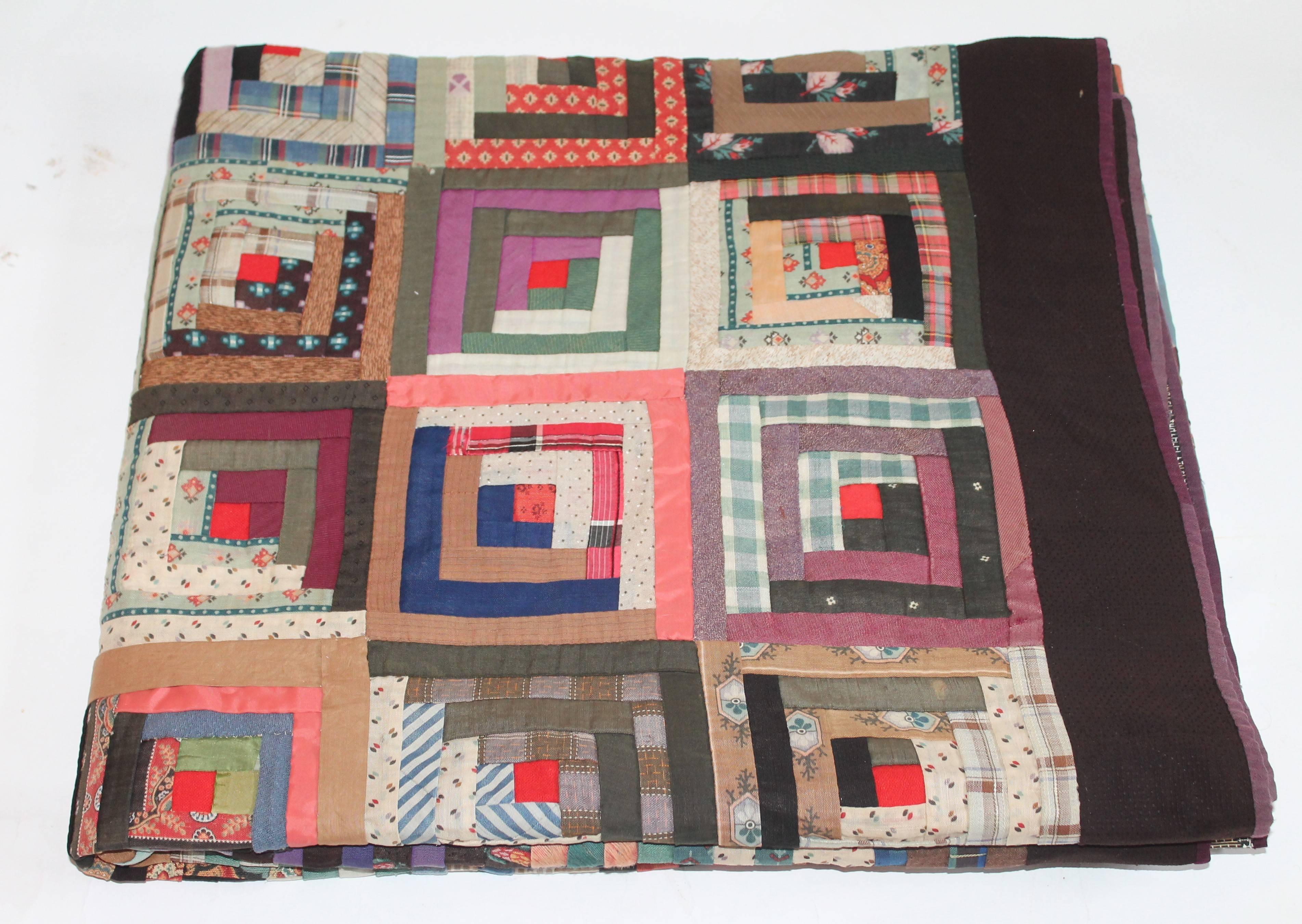 This amazing early 19th century barn raising pattern wool log cabin quilt has amazing graphics and piece work. Look at the close up photos for nice piece work. The condition is very good with minor wear in a couple small spots. Great addition to any