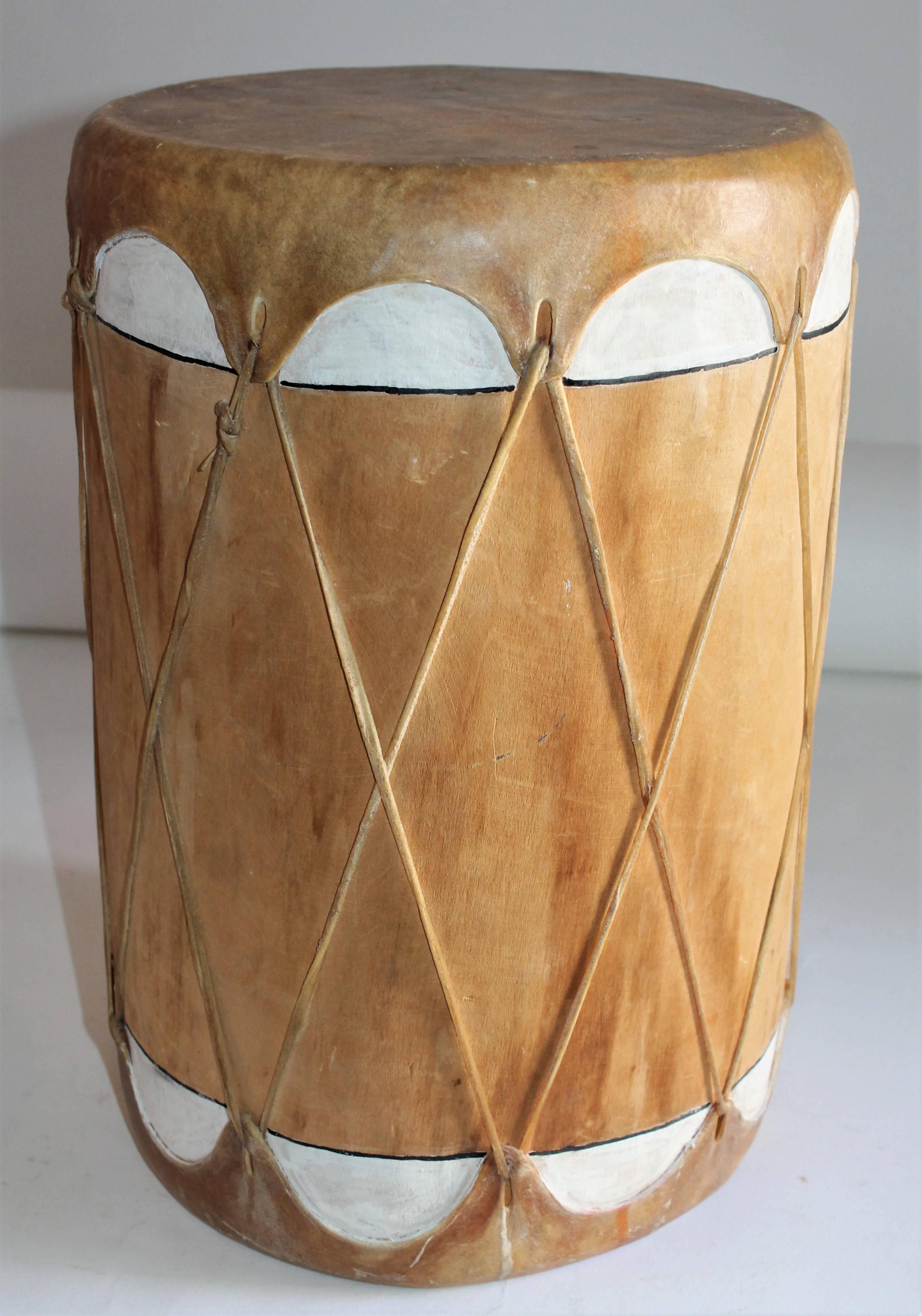 This Pueblo Indian ceremonial drum is in fine as found condition and is trimmed in original white paint. The drum is in great working order.