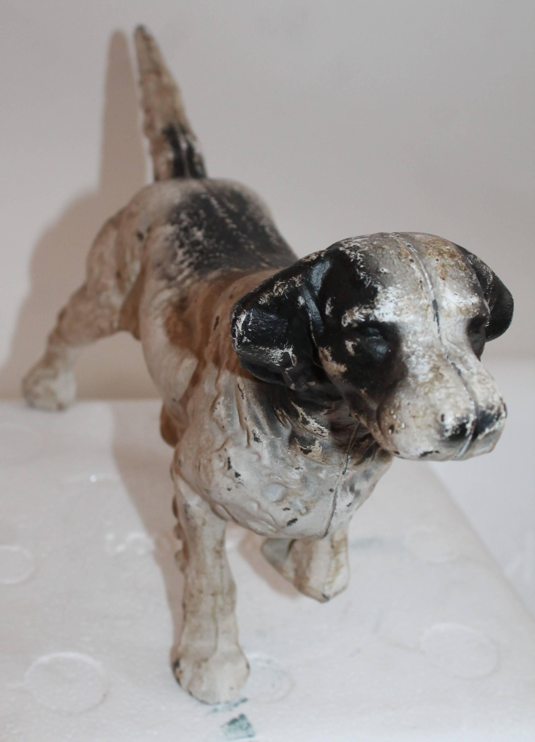 This original painted and slightly worn Hubley dog door stop is in great condition and is very heavy.