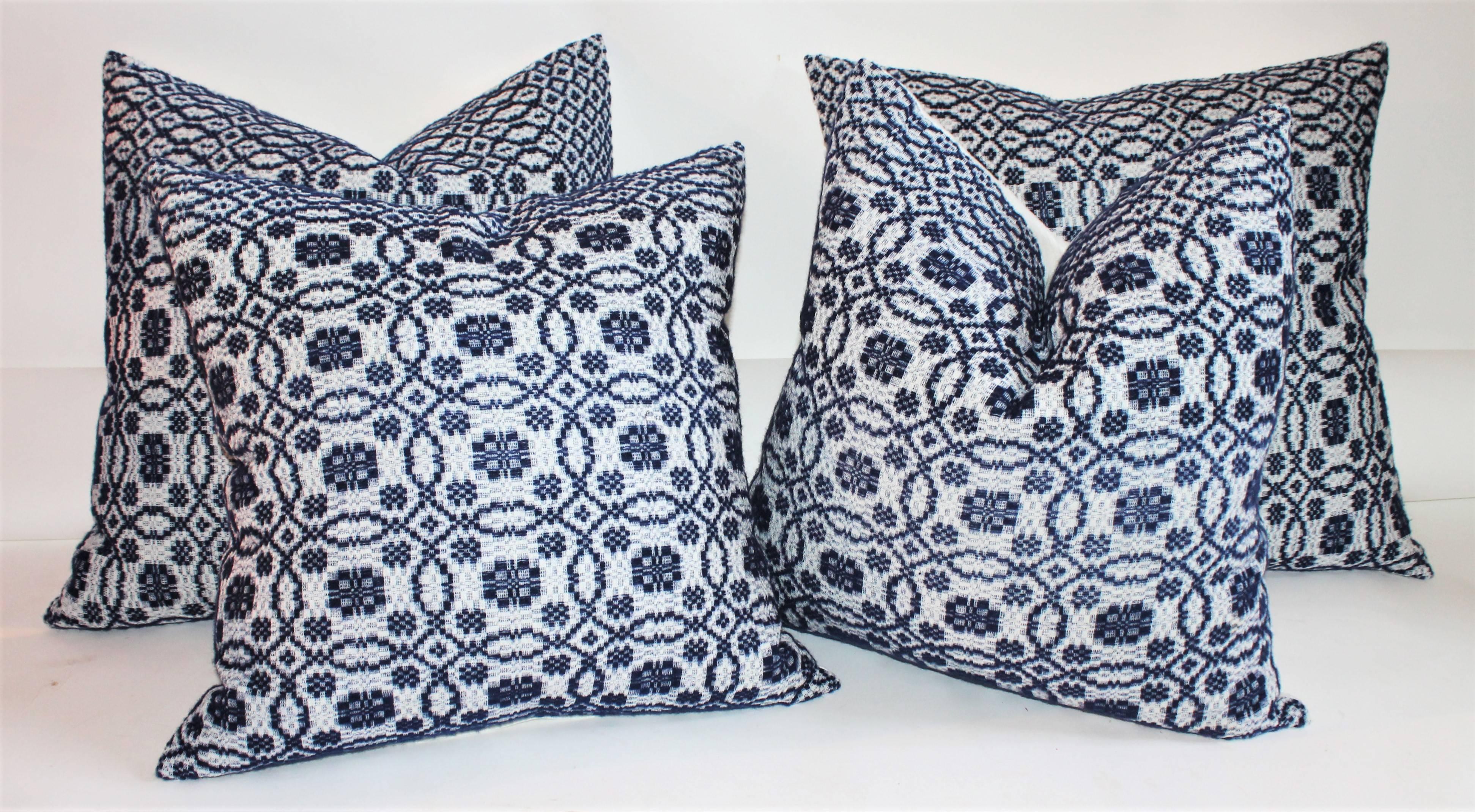These early 19th century woven coverlet pillows in indigo blue with crisp white cotton linen backing are in pristine condition. Sold as a group of four. We have two pairs of 20 x 20 and two pairs of 22 x 22 in stock.


Small pair 20 inches x 20