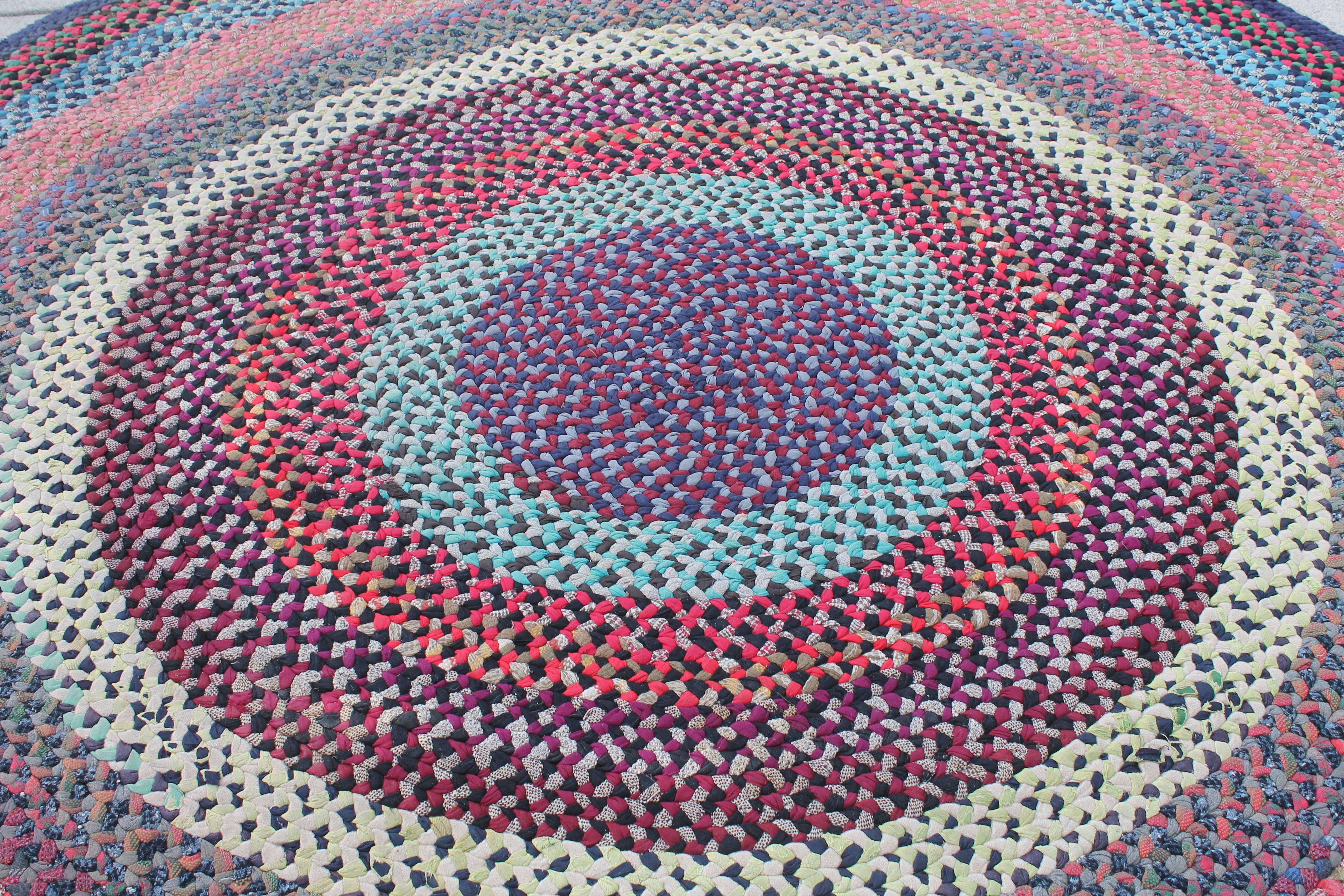 Round braided rug from Pennsylvania in very good condition. The round braids are much harder to find then the oval. The colors are multi.