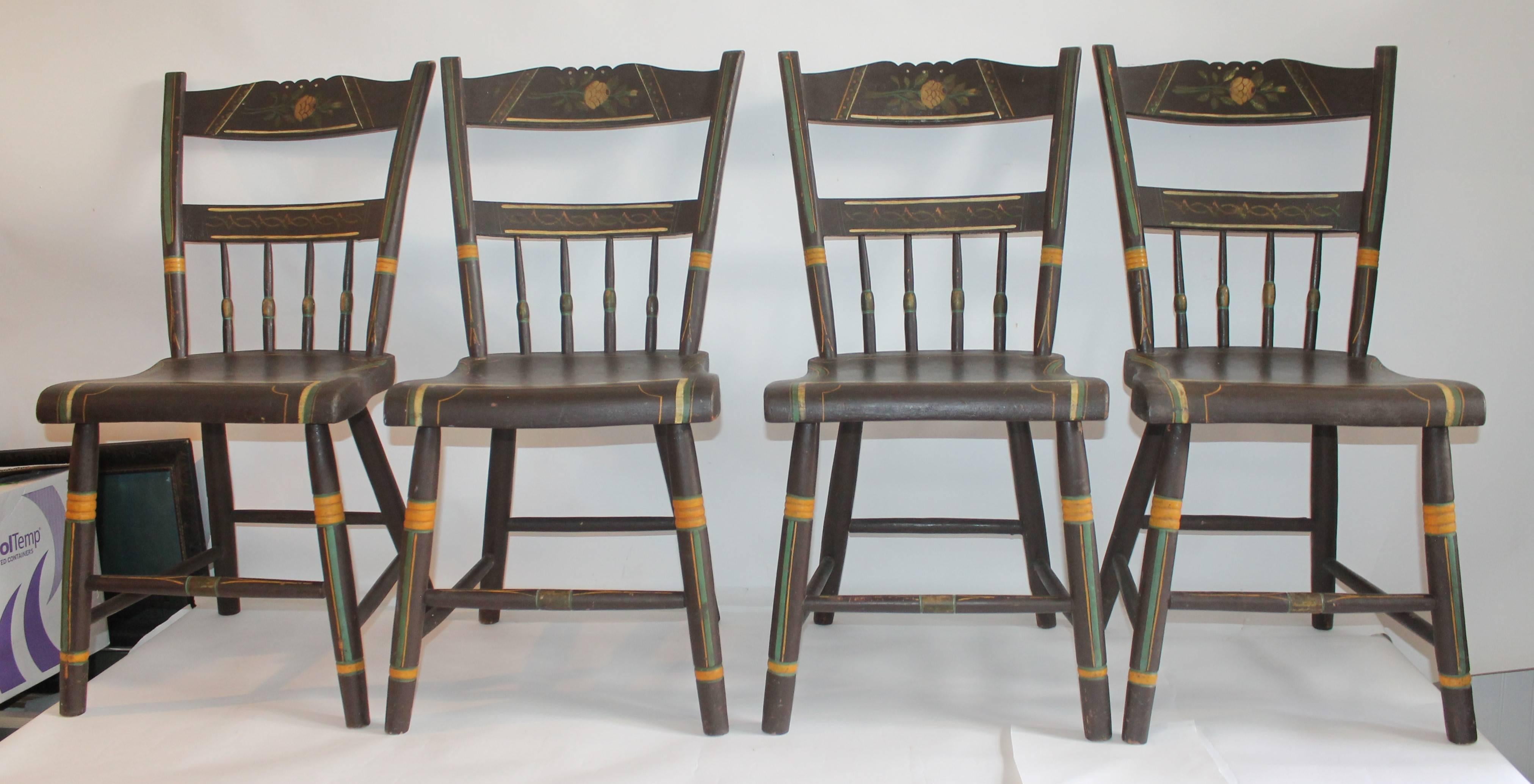 These 19th century original painted and decorated plank bottom chairs are in fine condition. These finely decorated chairs are signed on the bottom : PAINTED BY W.S. PIPER , SPRING RUN, PA. The chairs dated from the third quarter of the 19th century