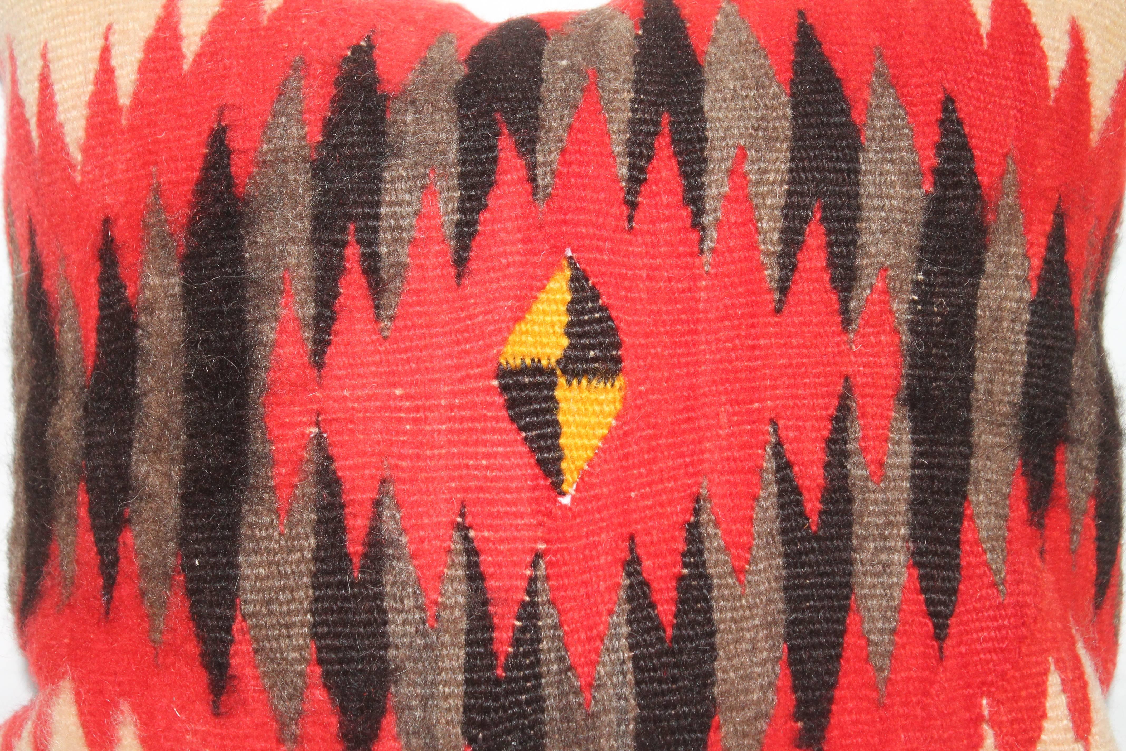 This early 1900 Navajo weaving eye dazzler is in fine condition with a soft aged Alpaca wool feeling. This interesting pattern looks like a seeing eye design.