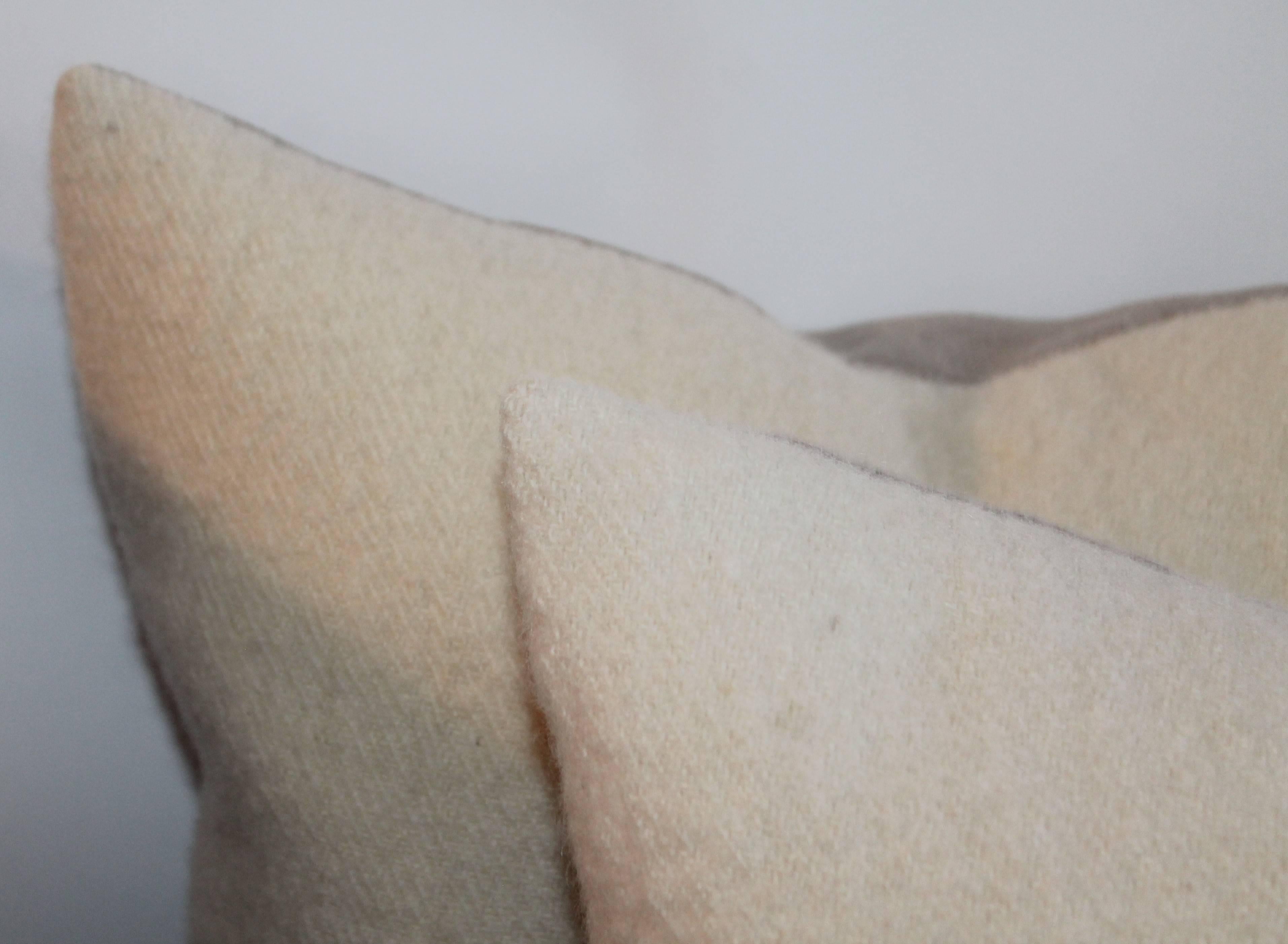 This pair of cream mohair pillows are in pristine condition. The backing is in a cream / tan cotton linen.
