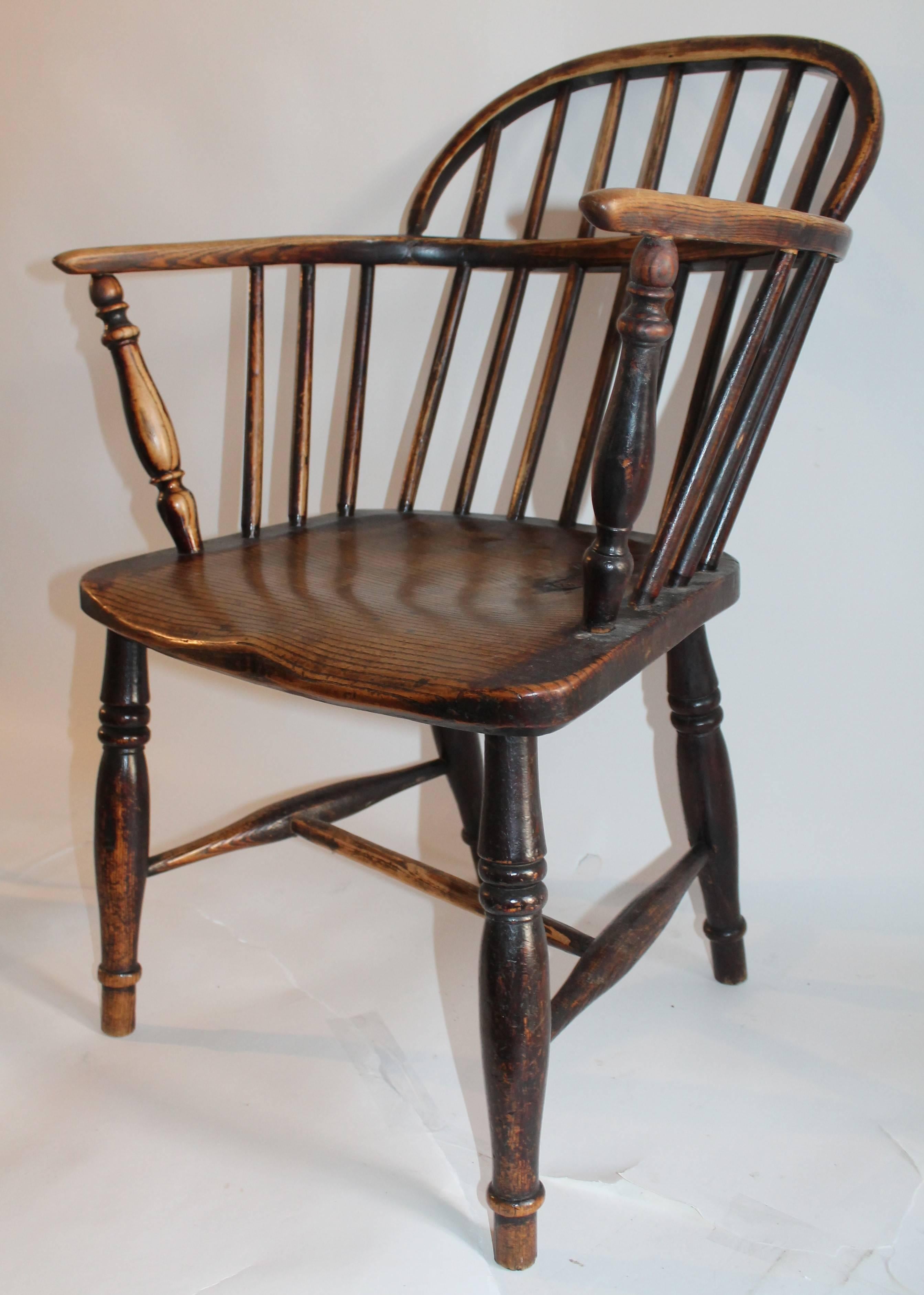 This early English 19Th century Windsor chair has been tightened for maximum comfort and is in good condition. This Windsor chair is in excellent used condition and has wear consistent with age and use. The rounded back seat height is 16.5 inches.