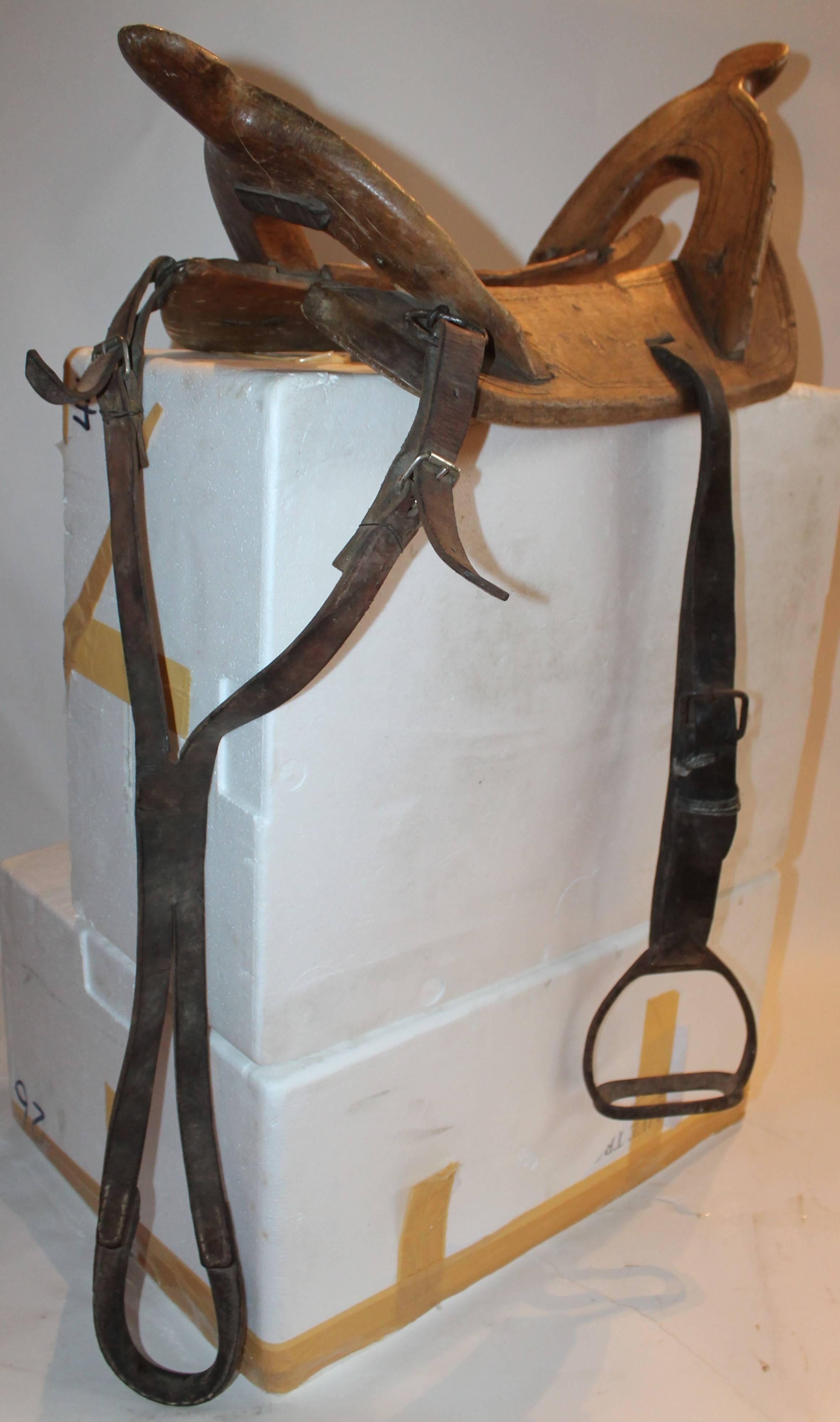 wooden horse saddle