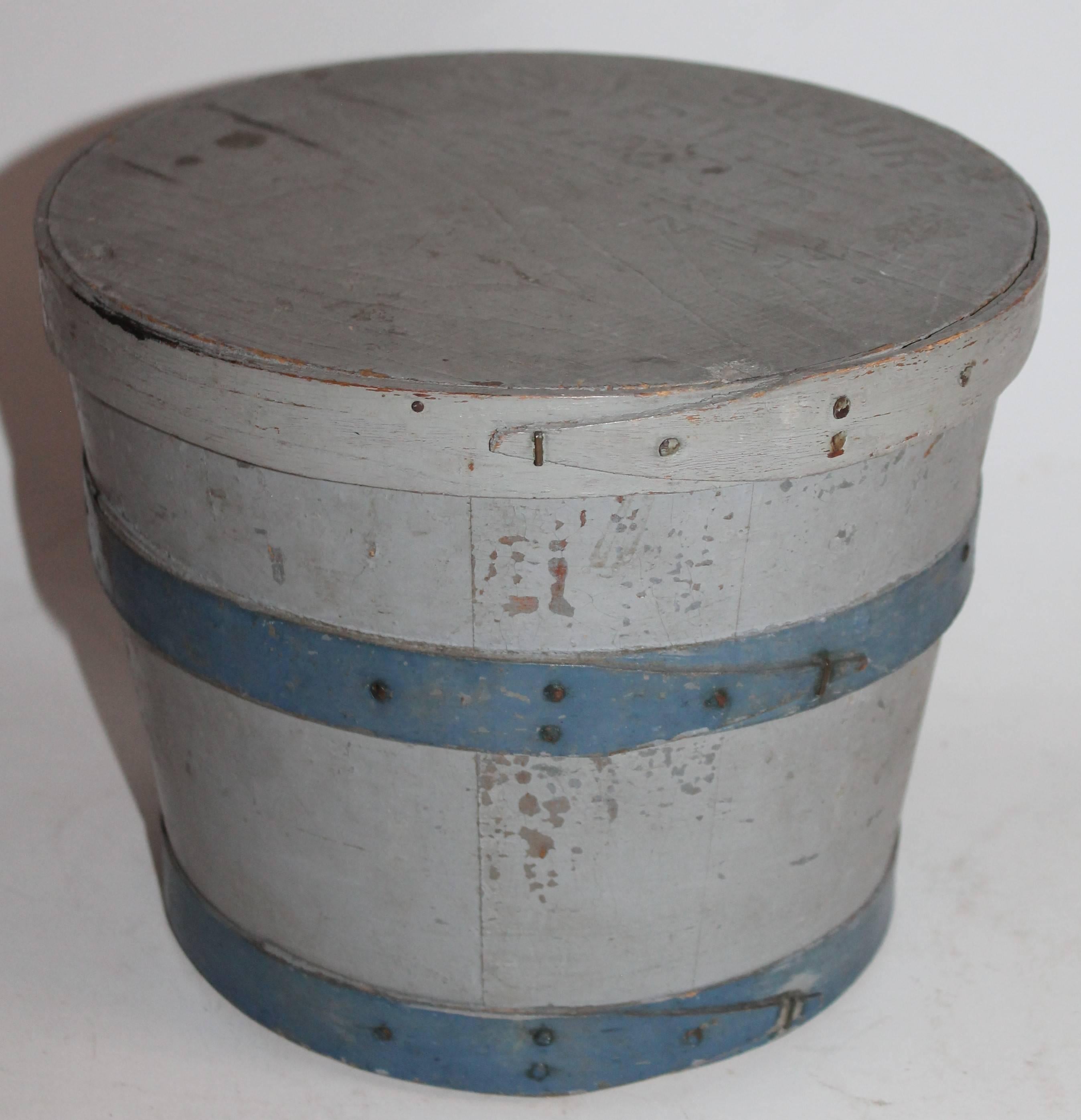 This 19th century lard bucket in original blue and grey painted surface is in fine as found condition. The lid is stamped P.Square Pure Lard Co. under the painted surface. Fantastic striped surface.