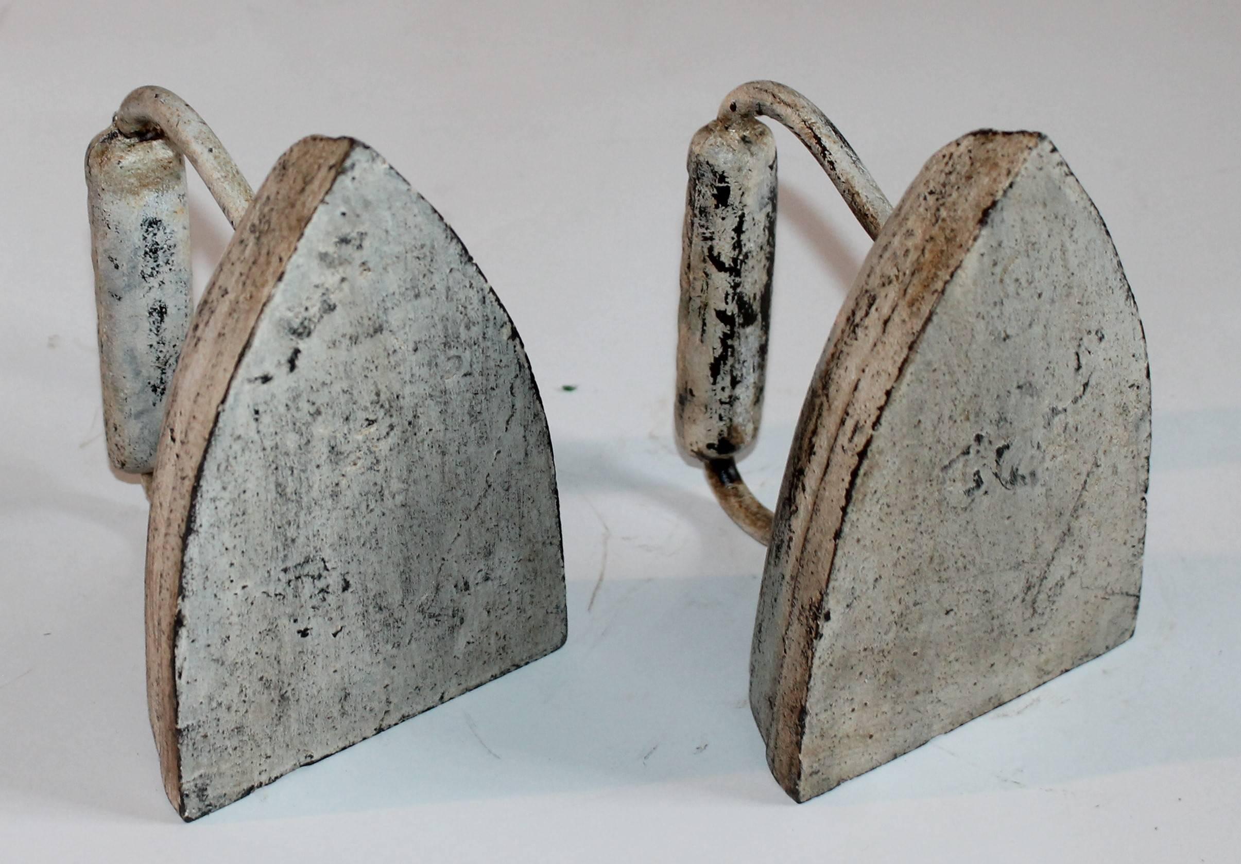 American Bookends / Pair of Matching 19th Century Original Cream Painted Sad Irons For Sale