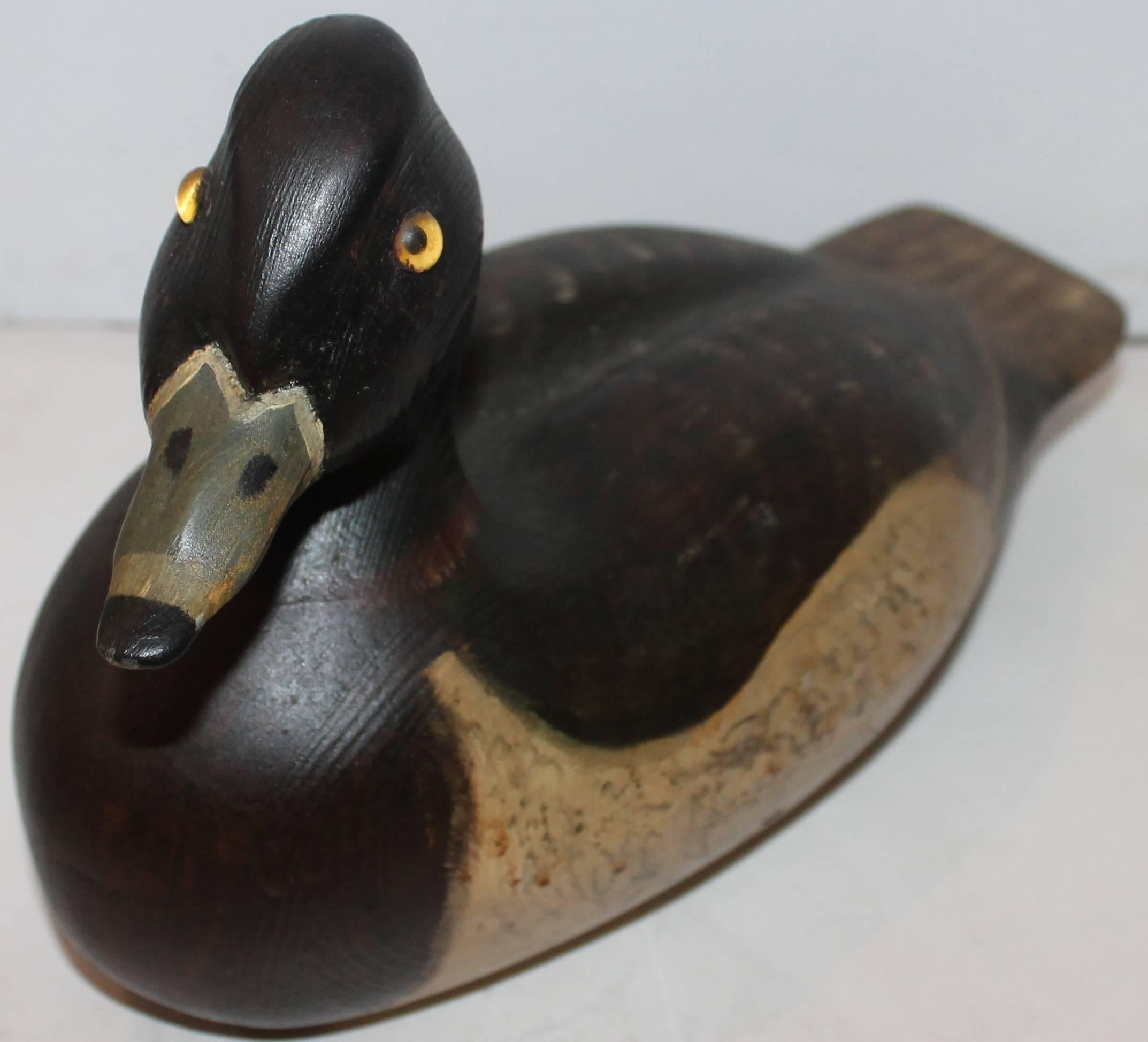 This wonderful hand-carved and painted decoy is signed Ringneck, 1990. This was made for a friend and given as a gift. Condition is mint. Great patina and untouched surface.