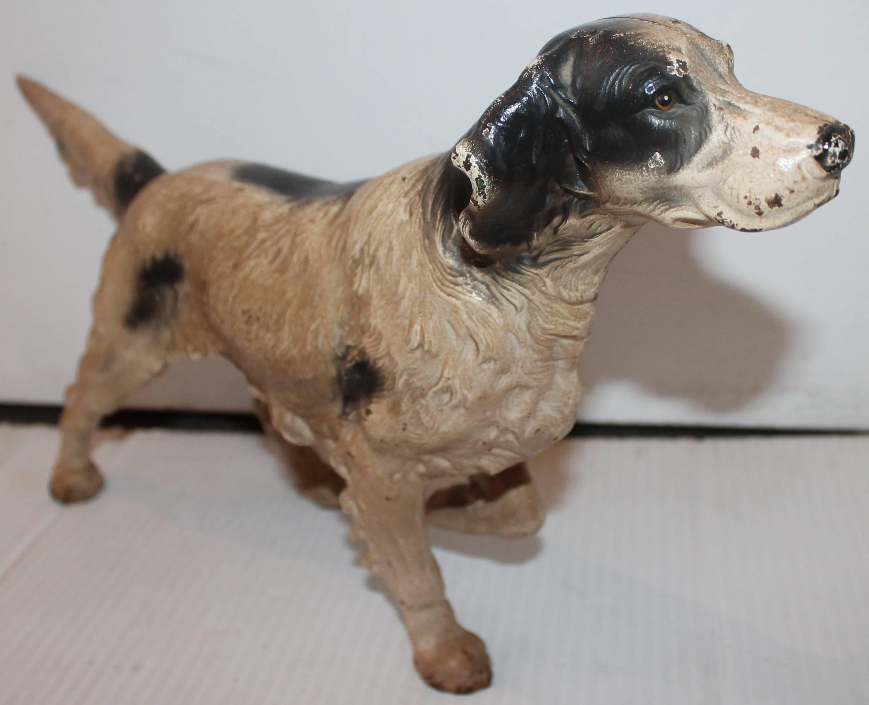 This amazing original painted Hubley iron door stop is in great painted condition. Irish setter door stop.