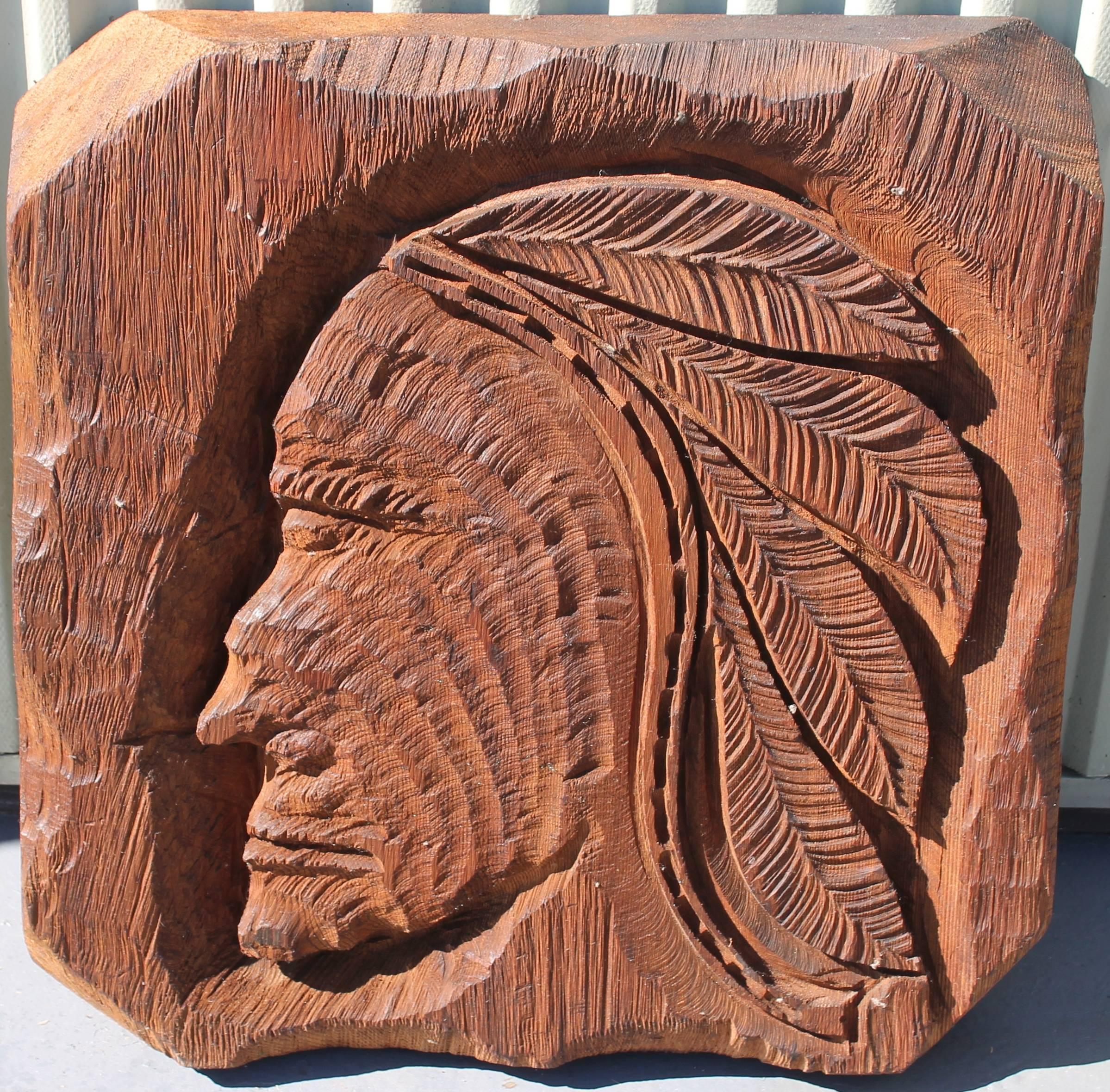This amazing monumental hand-carved Indian plaque is in very good as found condition. Found in a early estate in California and originally purchased in Santa Fe, New Mexico. It is all hand-carved from one piece of wood. It is believed to be redwood.