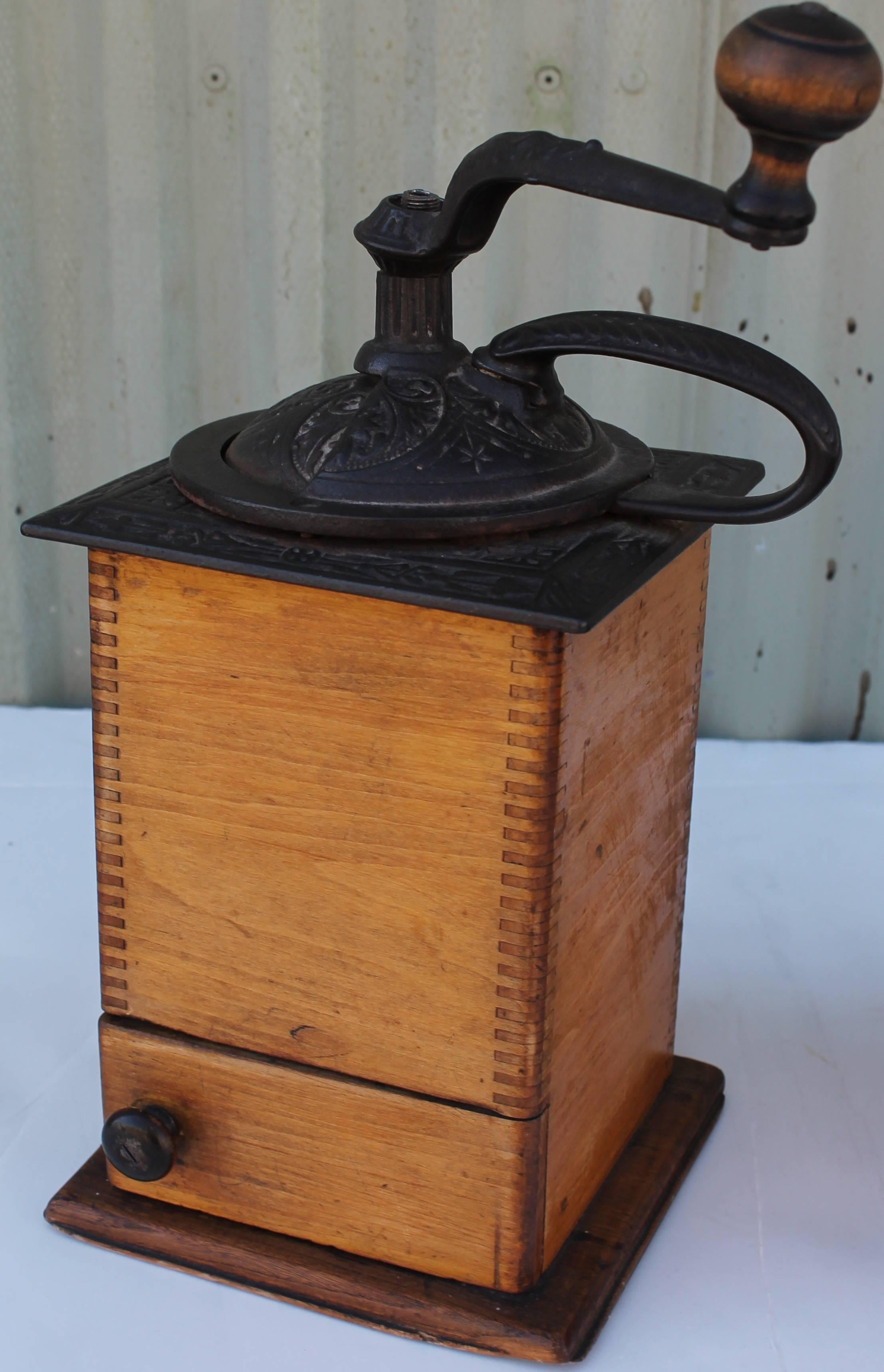 This wonderful pair of dovetailed pine coffee grinders are in fantastic condition and all original. Both grinders are in perfect working condition. The large one is 13