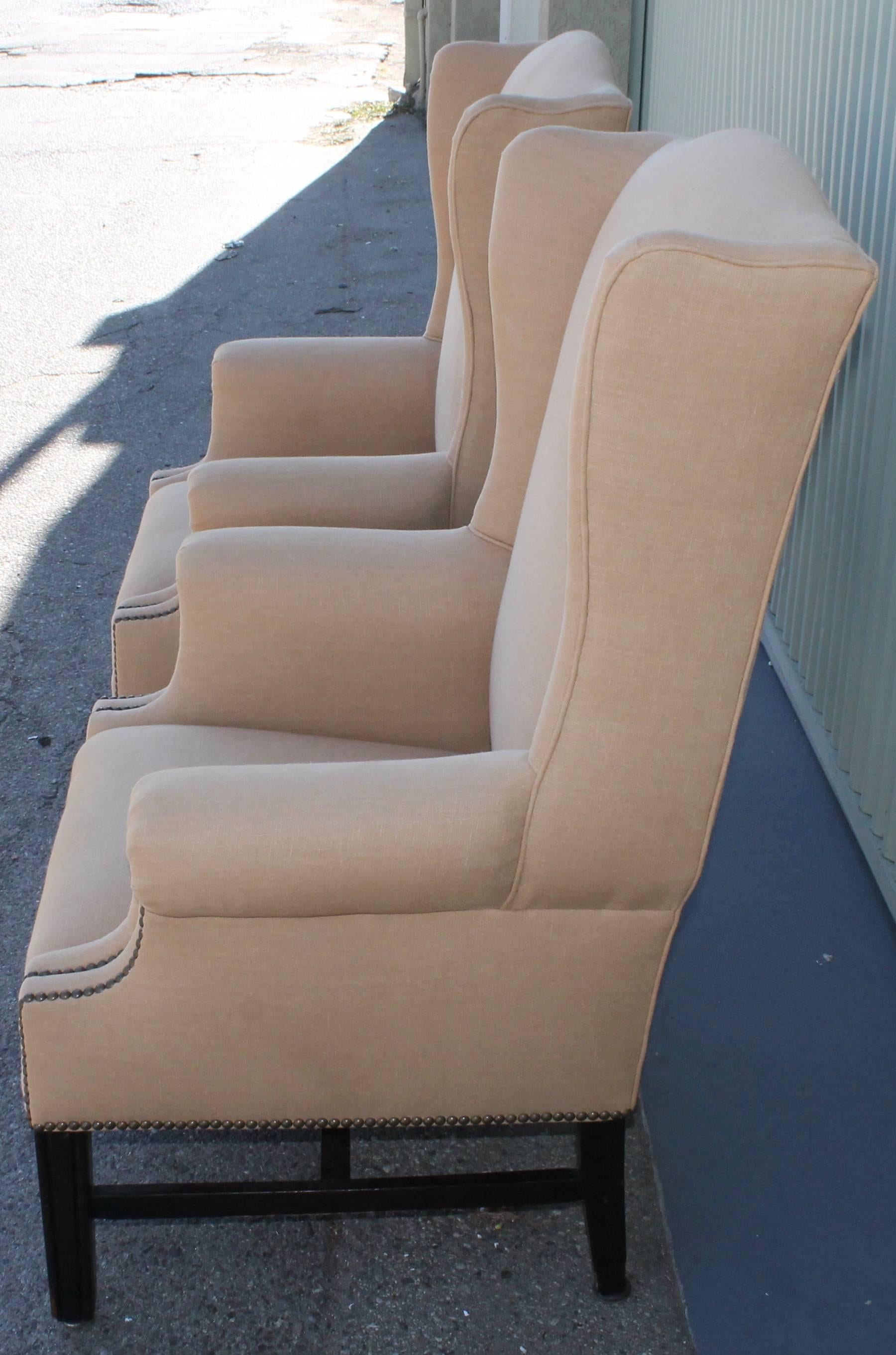 American Pair of Fantastic 1920s Wing Chairs in Camel Linen