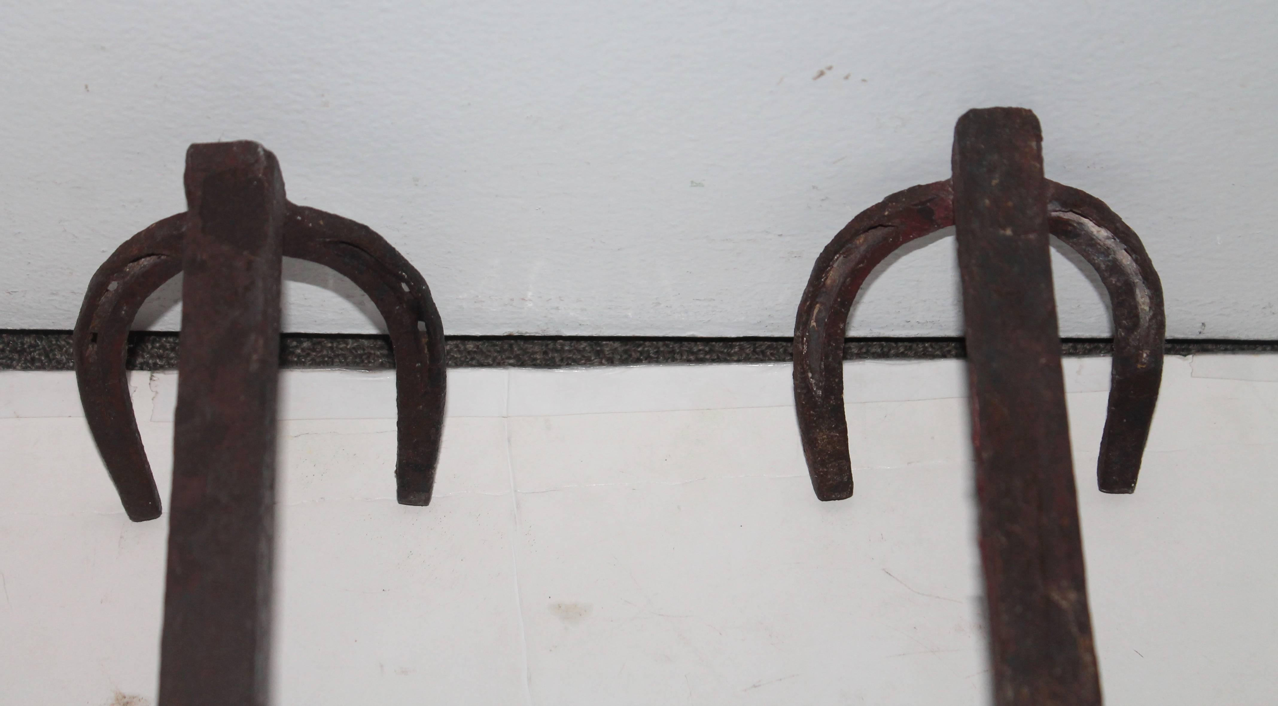 Early 20th Century Iron Horse Shoe and Horse Head Andirons In Excellent Condition For Sale In Los Angeles, CA