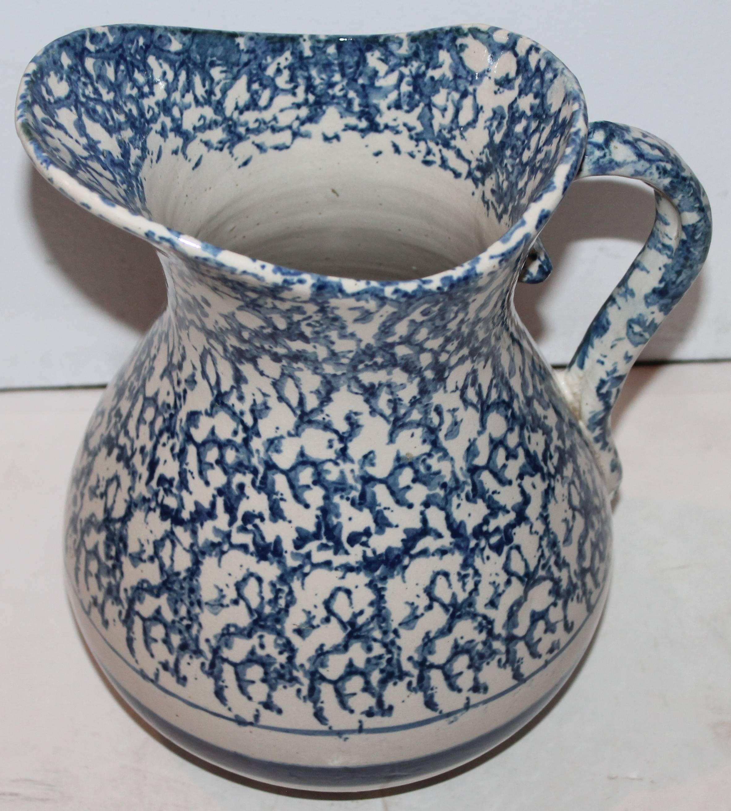 This fantastic very large spongeware pitcher is in mint condition and very rare to find. Most likely from a wash bowl and pitcher bath set. Great for flowers on a table.