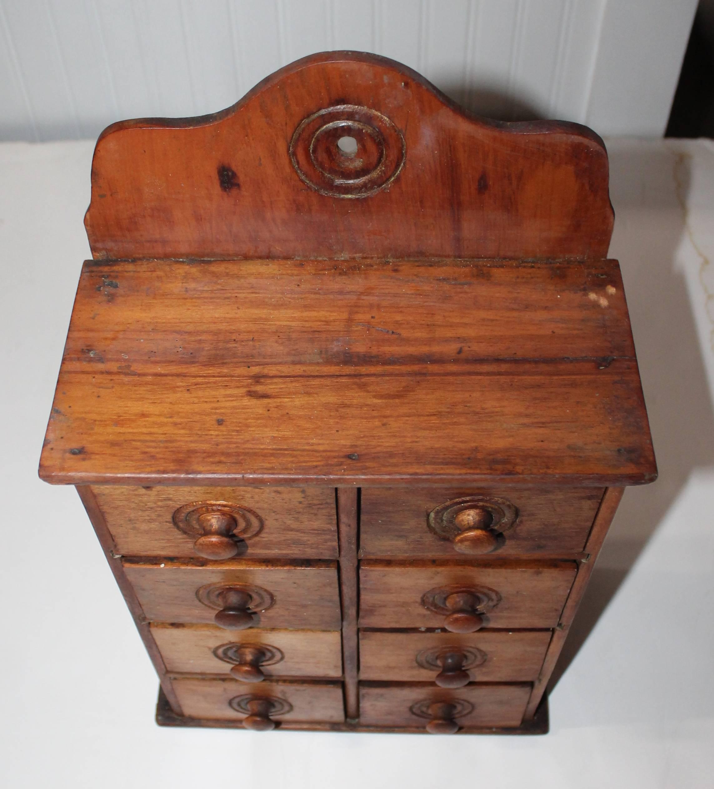 This eight-drawer 19th century spice cabinet is in amazing condition. Original knobs original old surface. This Item has minor wear consistent with age and use.