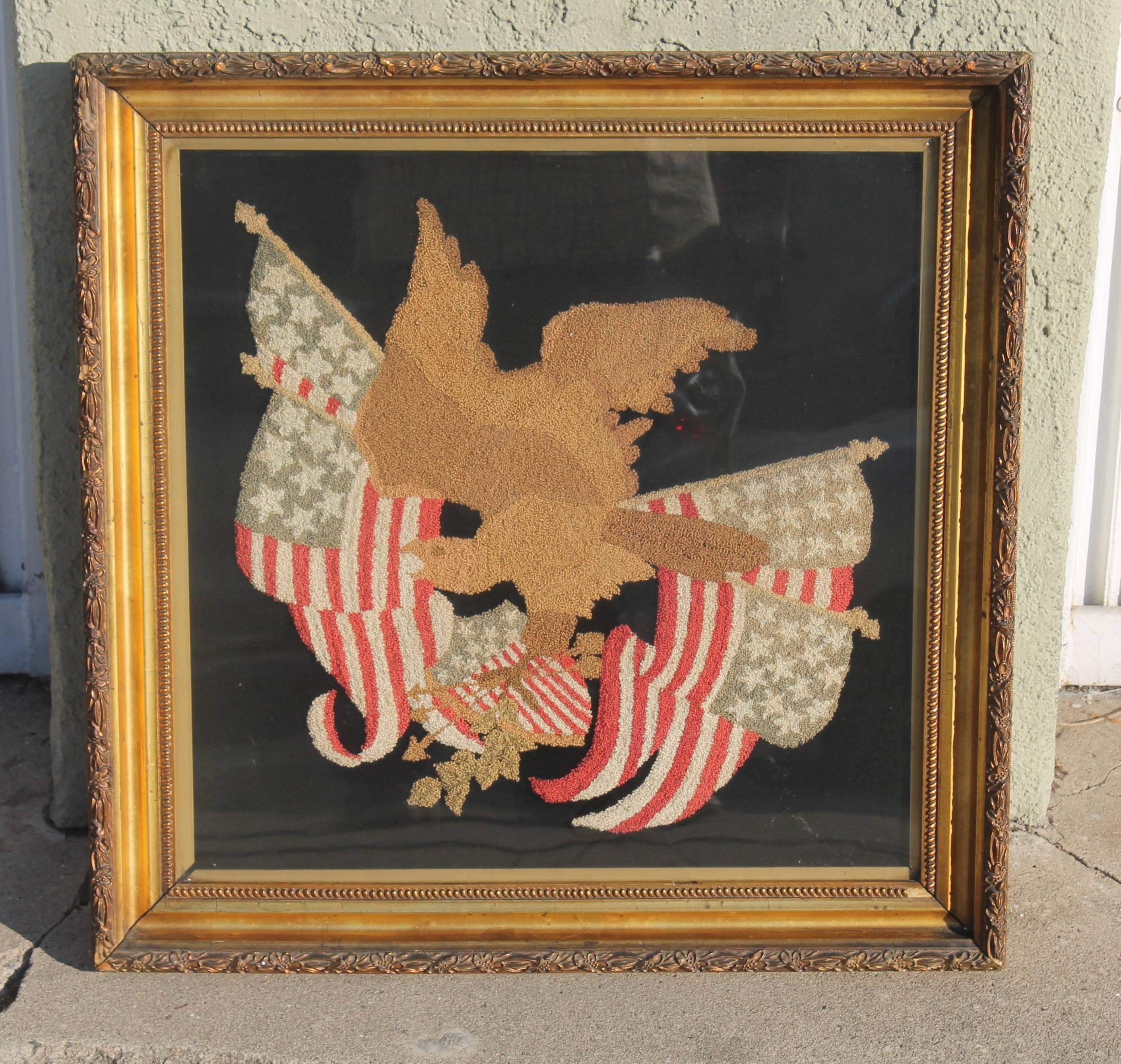 Exquisite mid-19th century embroidery crewel work handmade needle point. The blacking is made from wool and the needle work is also wool. Wool was used in needlework pre 1850s before the Victorian period. This item is placed in an original frame and