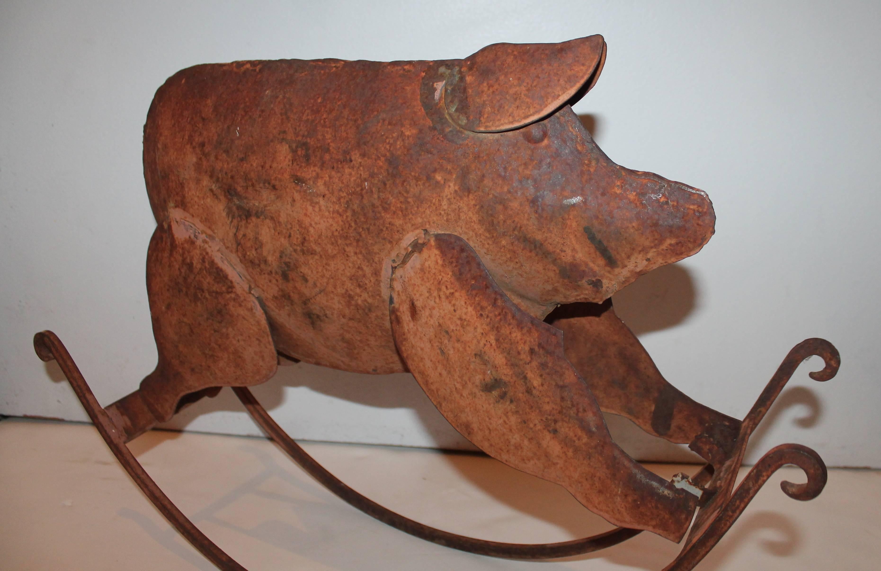 This is all original painted salmon and oxidized metal pig is handmade and in very good as found condition. Wonderful Folk Art and great above a cupboard.