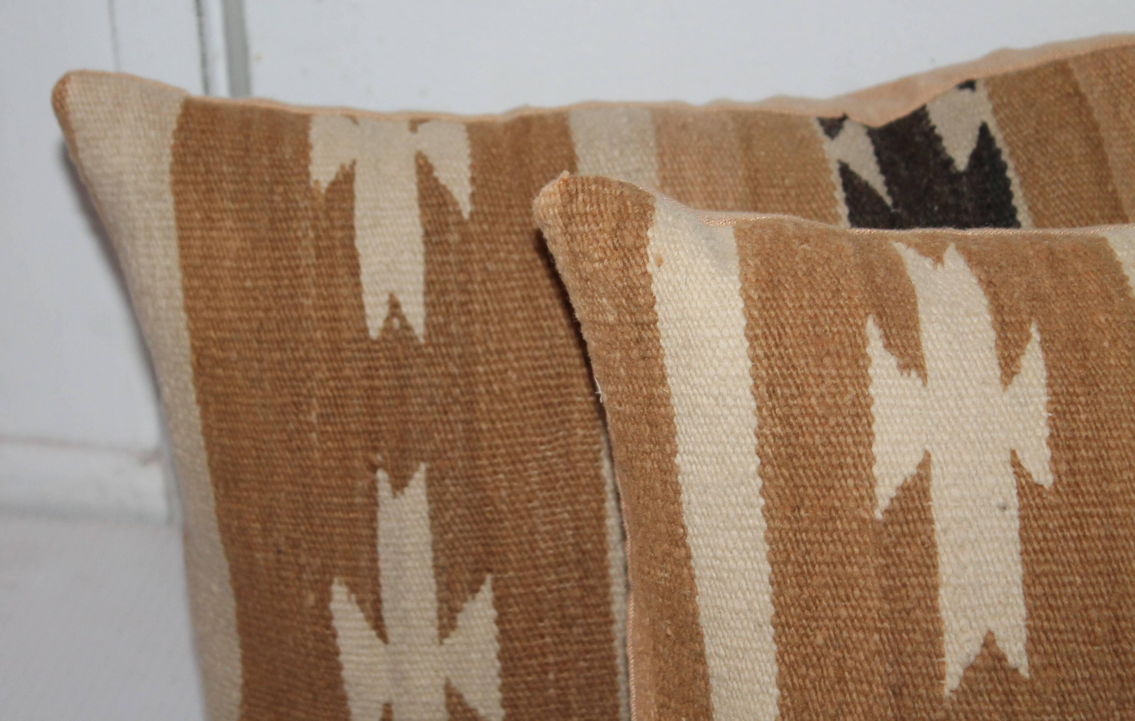 These weaving's have a nice mellow color and are in very good condition. The backing is in tan cotton linen.