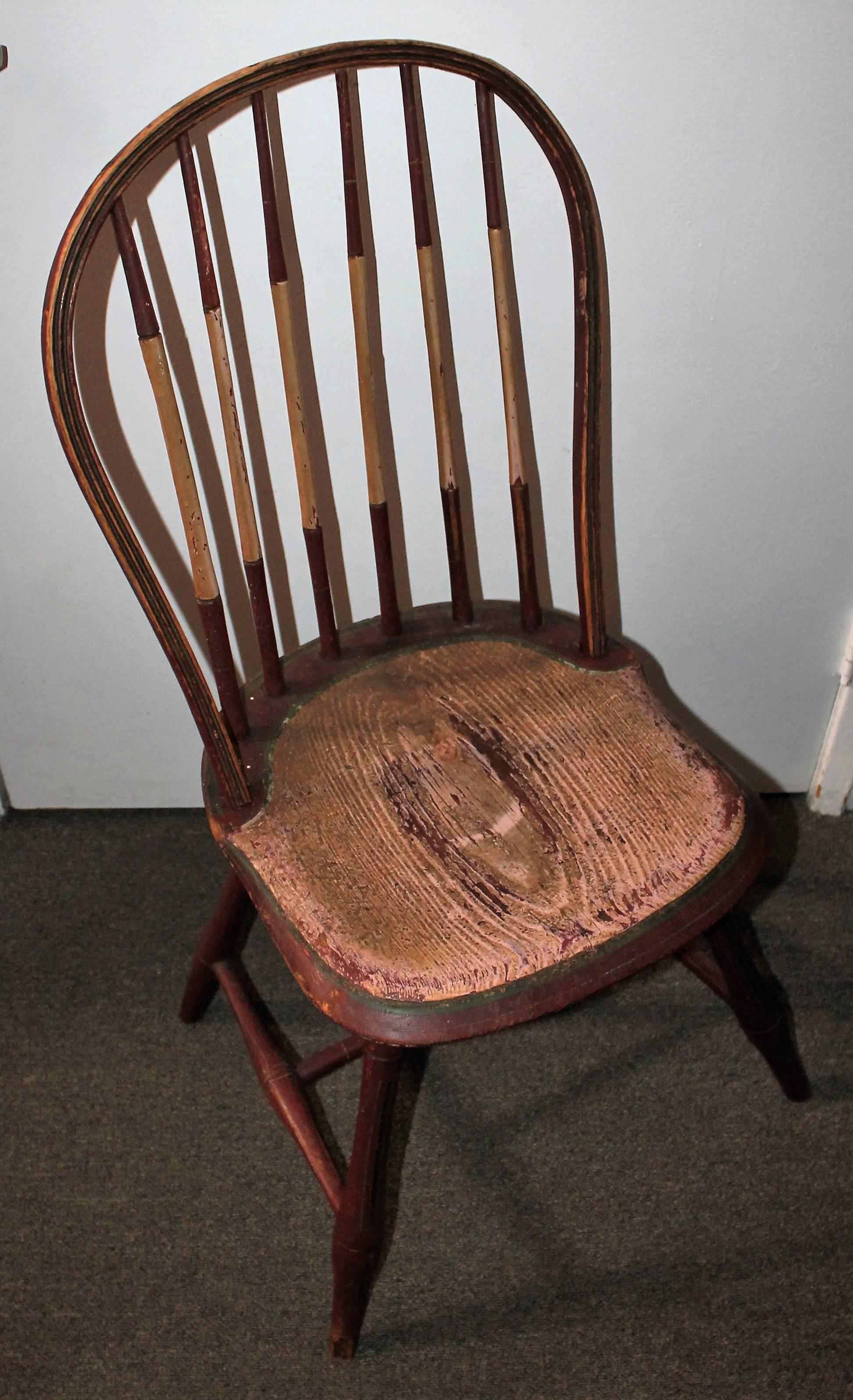 This rare Windsor chair is a great find. With all original paint this patina is amazing. With great form & condition this Windsor chair is strong and sturdy. This item has wear consistent with age and use. Seat Height is 18