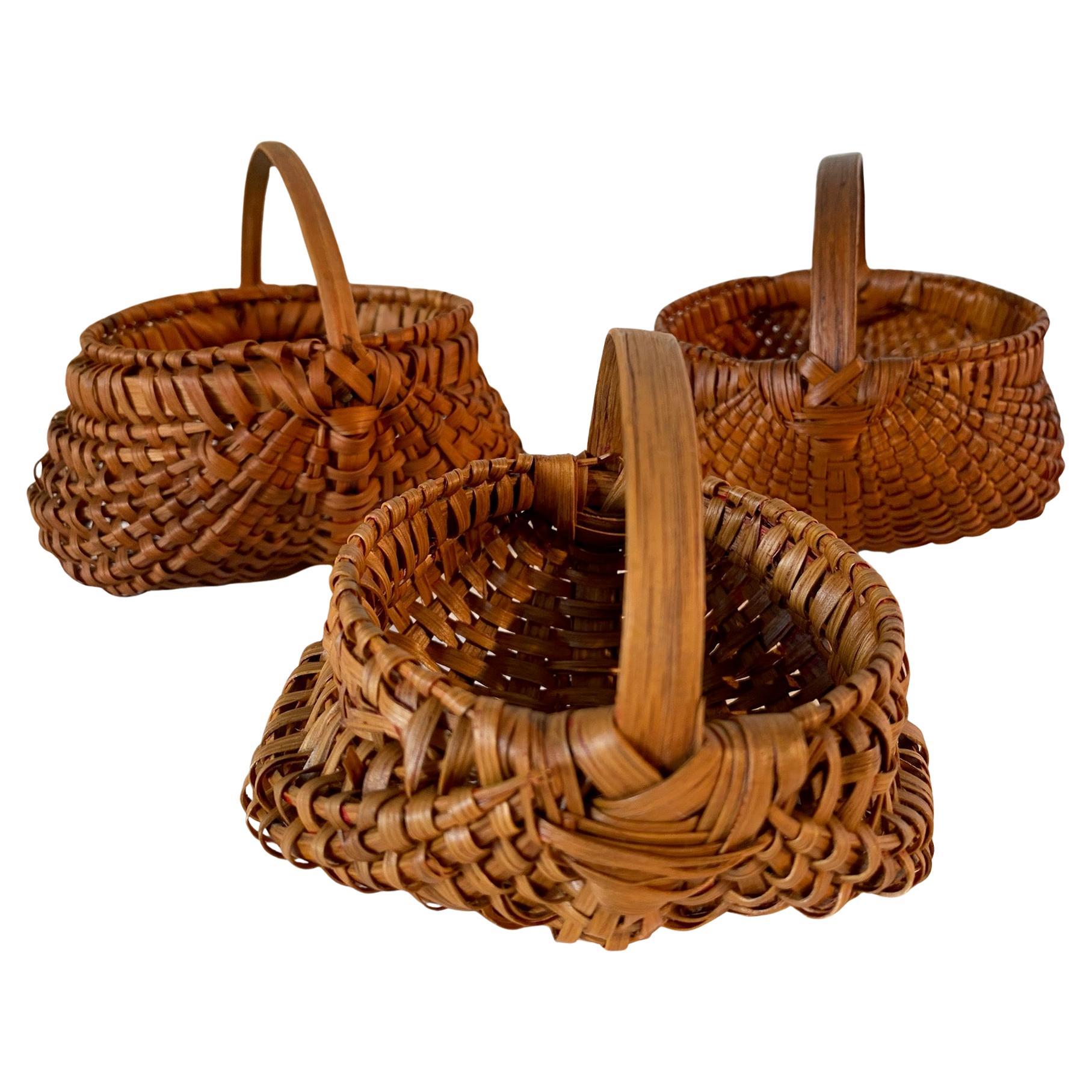 Colección de tres cestas de nalgas en miniatura