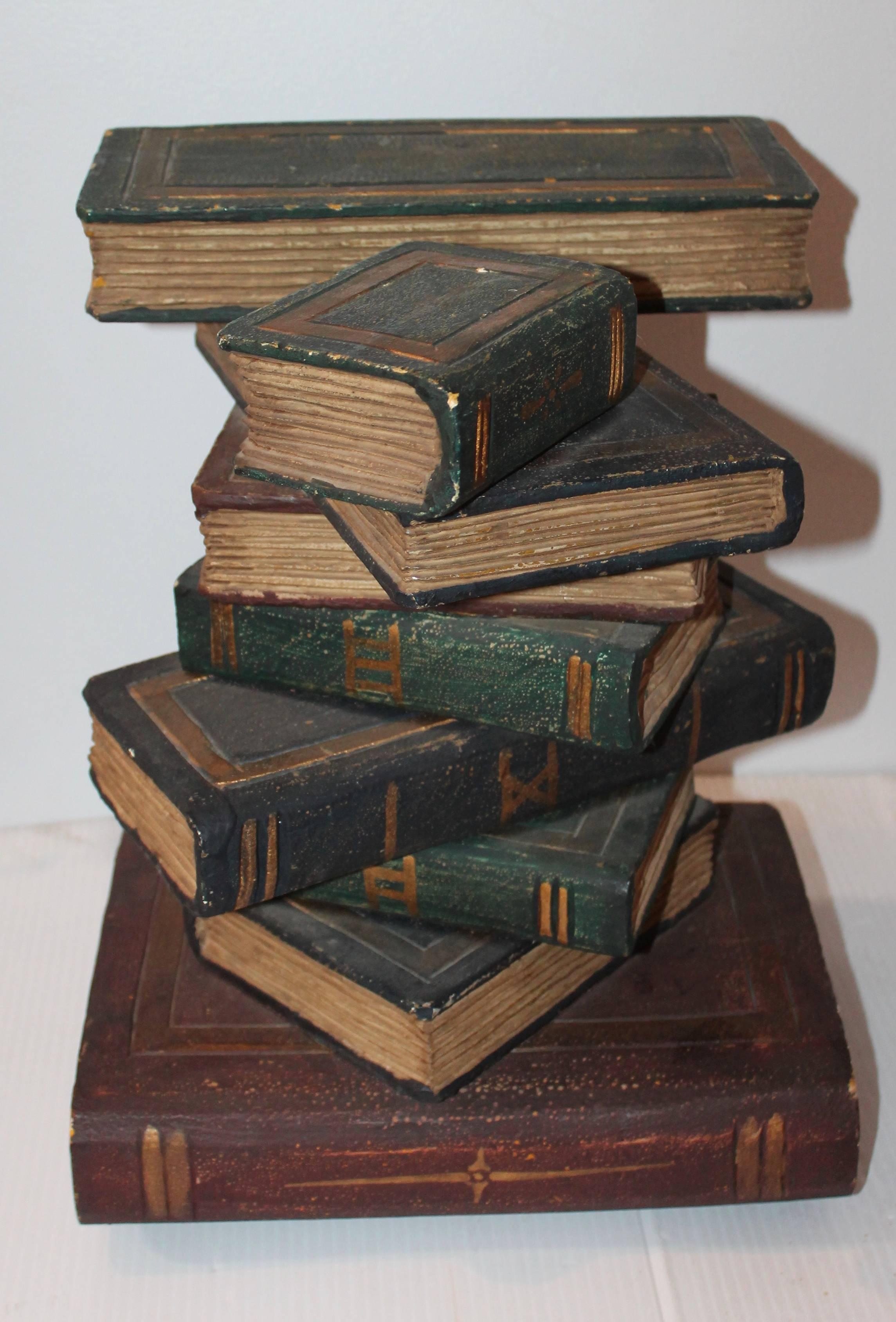 This fun side table is all wood and original painted surface. The condition is good with minor wear or chips consistent with age and use. This decorative stand has a coat of yeso on top of wood with a painted over surface. Possibly European.