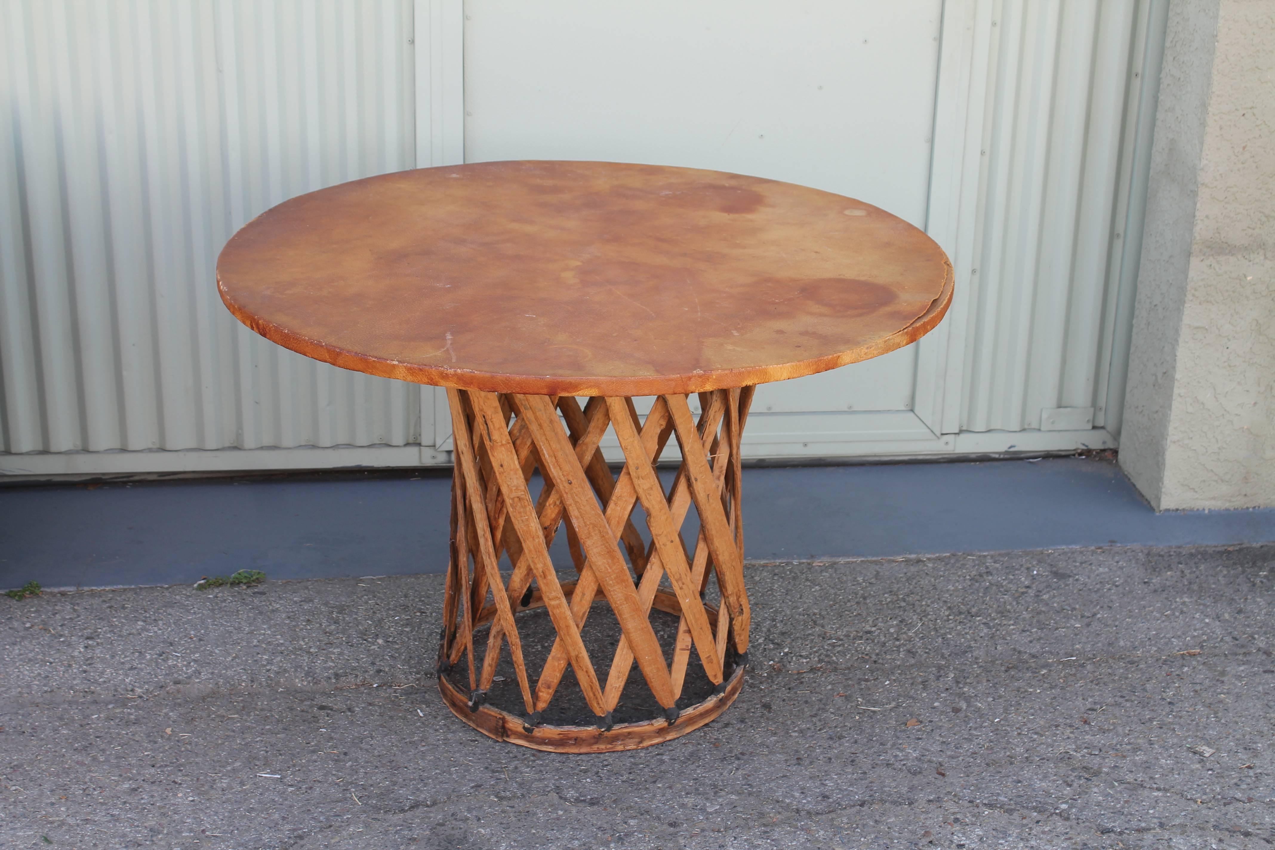 This amazing and folky handmade pigskin and wood Cabana style set is made in Guadalajara, Mexico. The condition is very good with minor spots and marks in the leather consistent with age and use. It's most unusual to find a complete matching set in