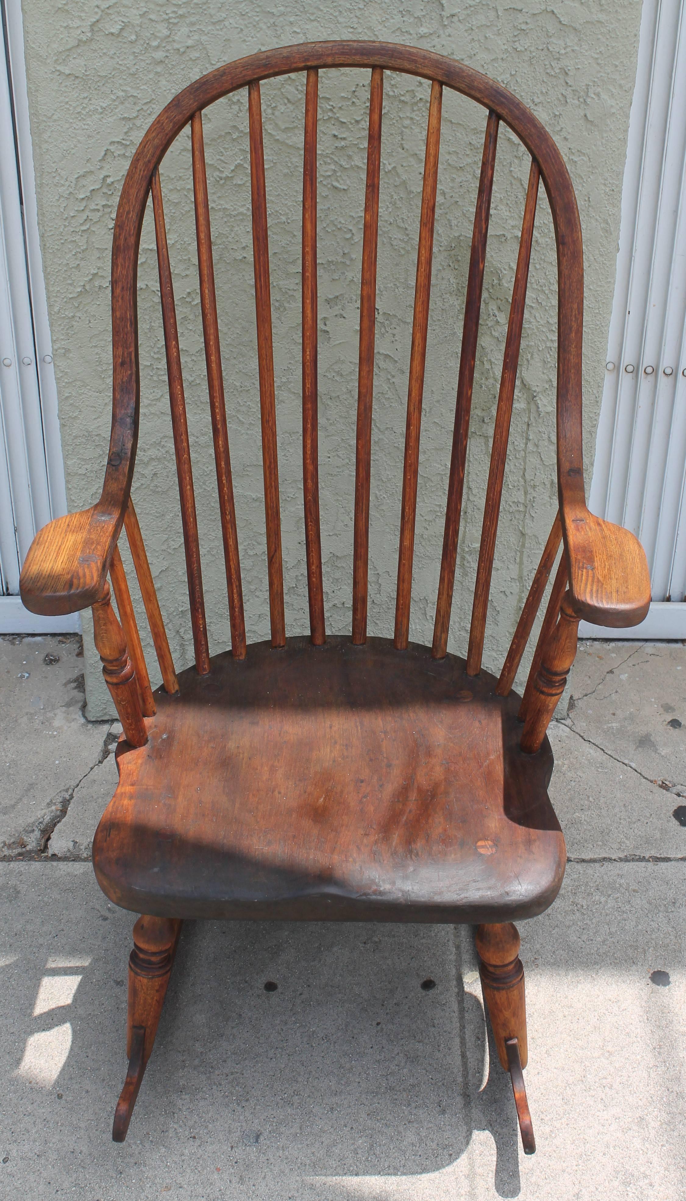 Early 19th century handmade amazing Windsor chair from New England. This chair is mortised and all hand-carved. The condition is very good with a nice mellow worn patina.