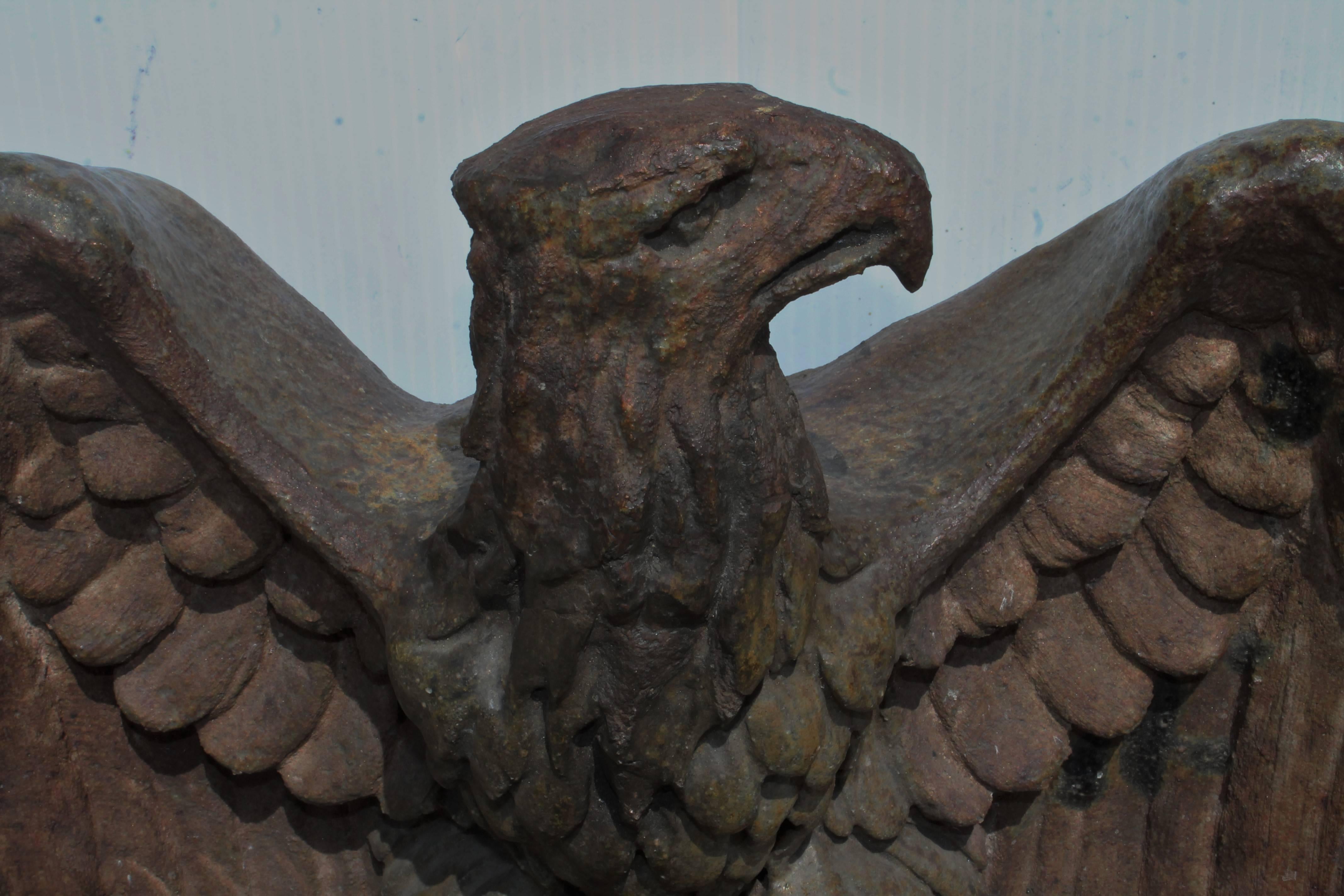 This amazing Folk Art sculpture of 19th century sewer tile or pottery eagle was from a private collection in New England. This item is on a custom-made cast iron stand.