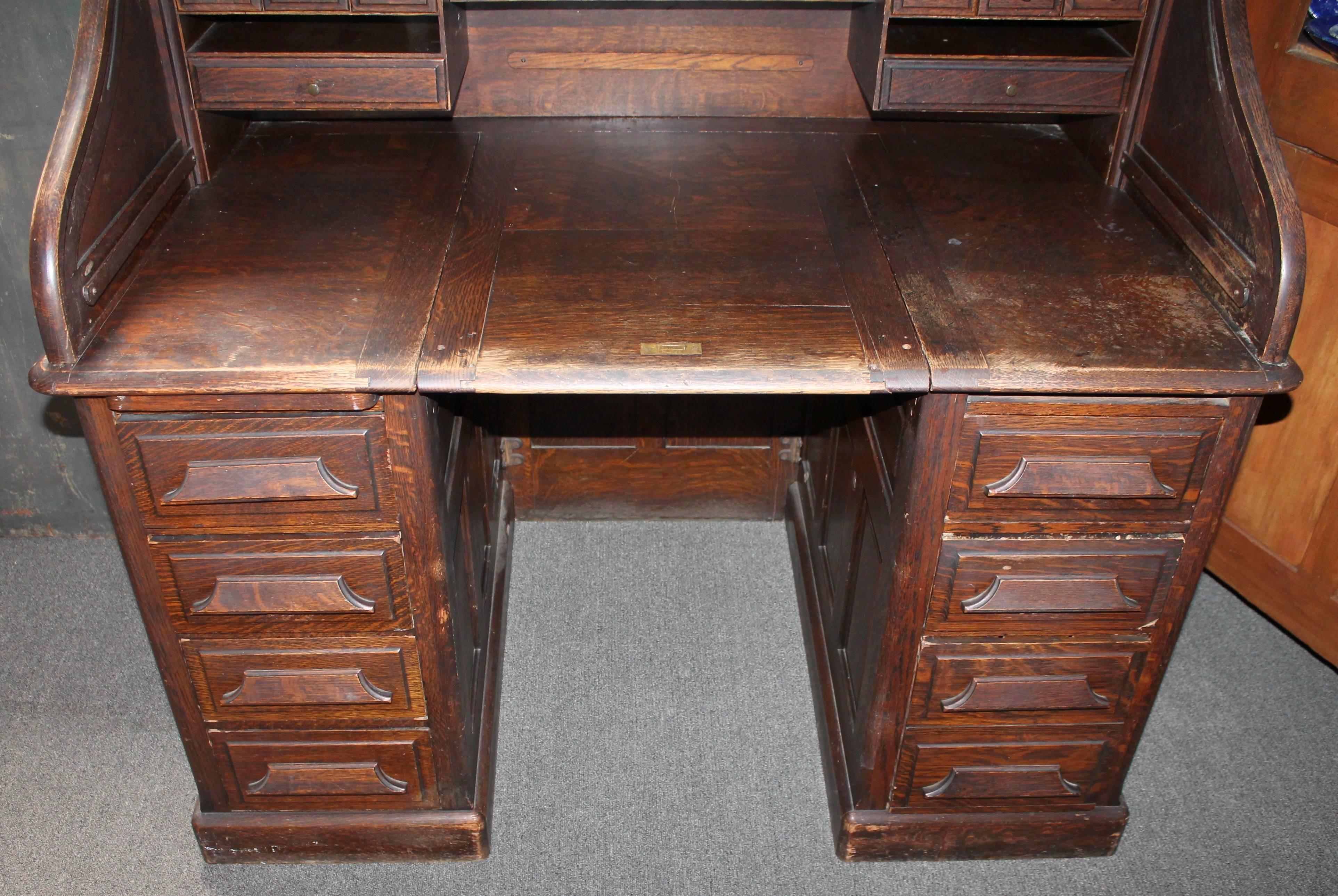 This amazing 19th century roll top desk was manufactured by the Gunn Furniture Company. established in the 1890's. This amazing roll top desk has and amazing patina with all original paint in mint condition. This item has all original parts. The