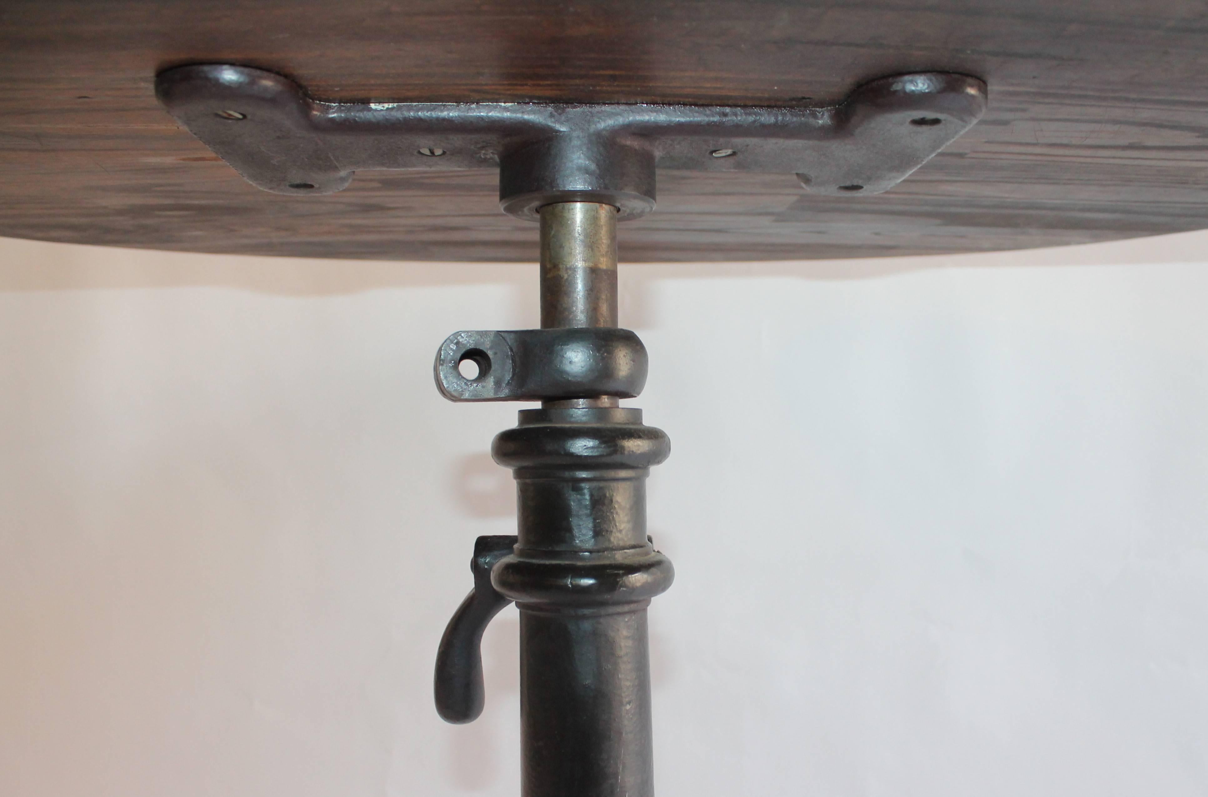 Patinated 19th Century Industrial Pedestal Table with Iron Base