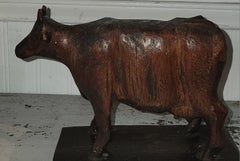 Signed M.O. Thomas Carved Wooden Cow