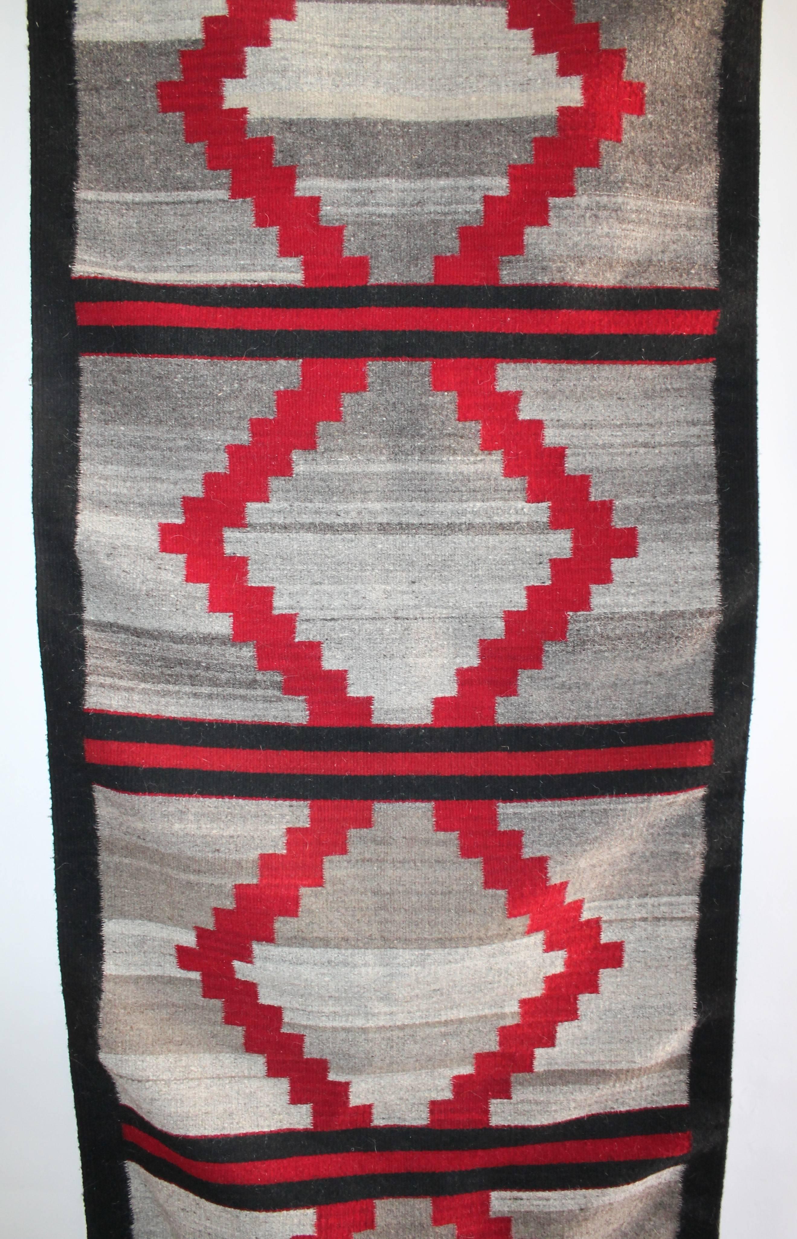 This is most unusual for a Navajo weaving or more very hard to find. The fringe is original and in great condition. The fringe is about four inches in.