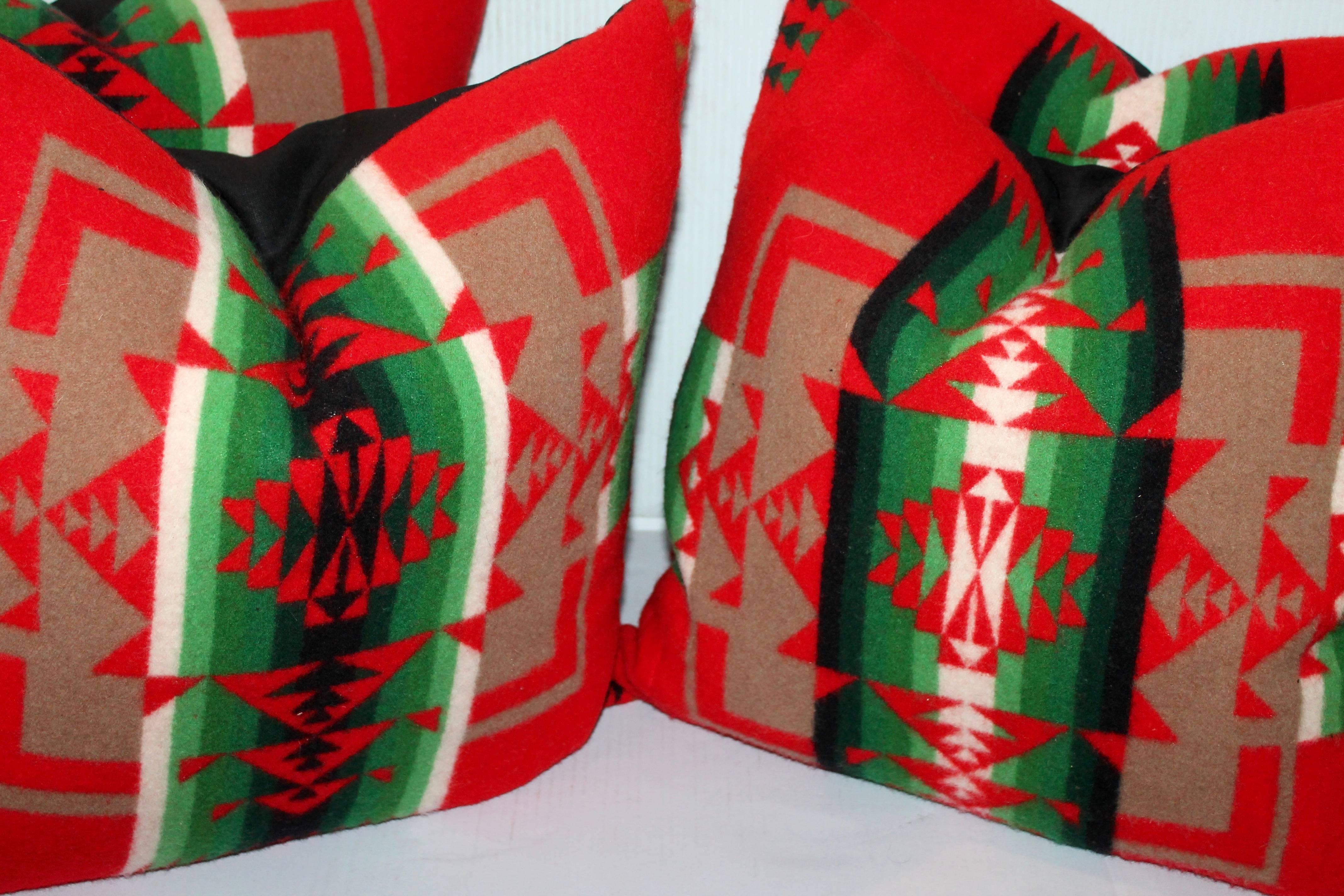 These amazing and graphic Indian camp blanket pillows are sold in pairs. The backing is a black cotton linen backing. They are made from a vintage blanket.