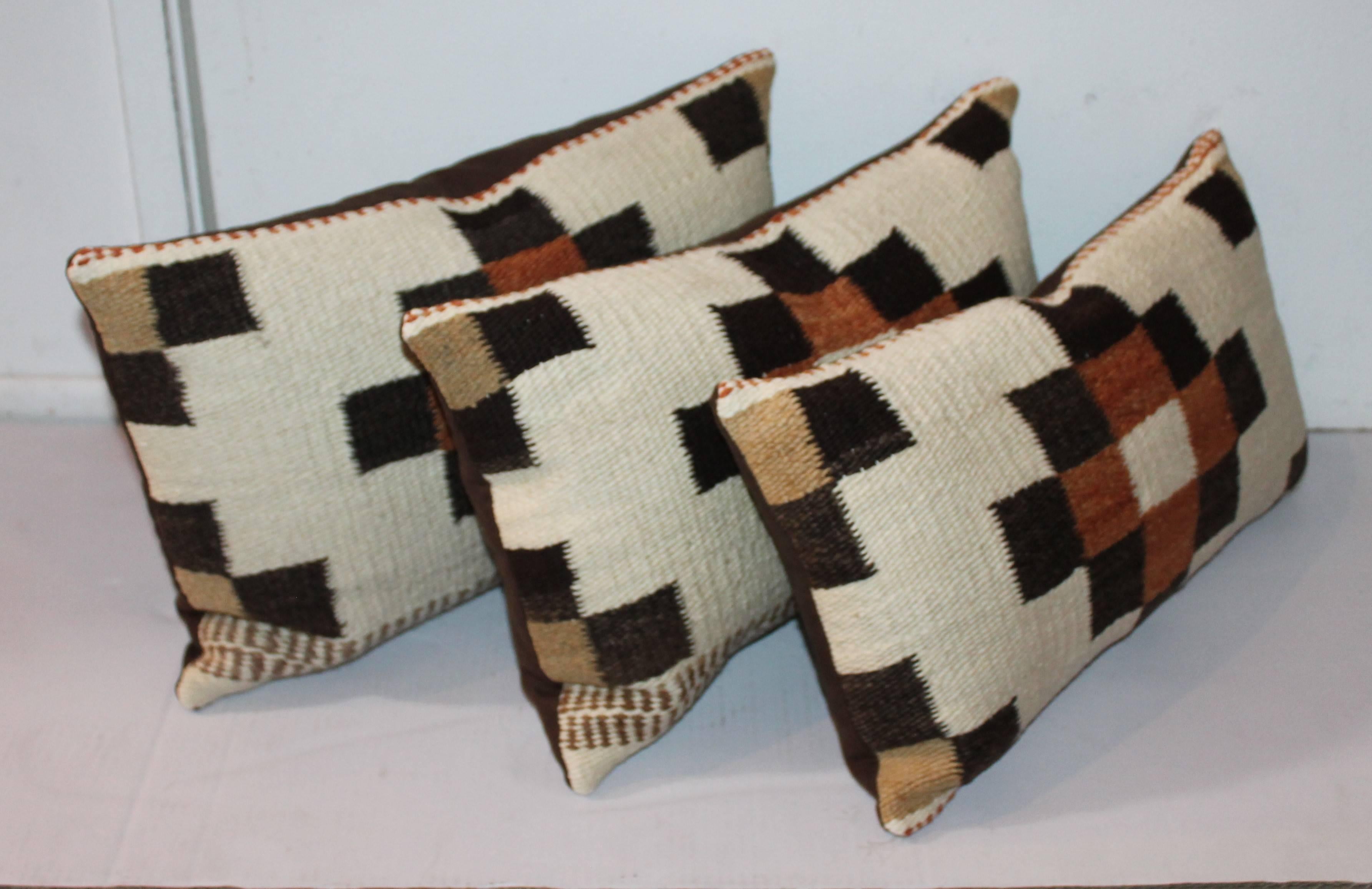 These pillows are from a Navajo Saddle blanket. The two larger pillows are 19 x 12 and the smaller pillow is 19 x 10. Selling as a group or 895. Each individually. The condition are pristine.