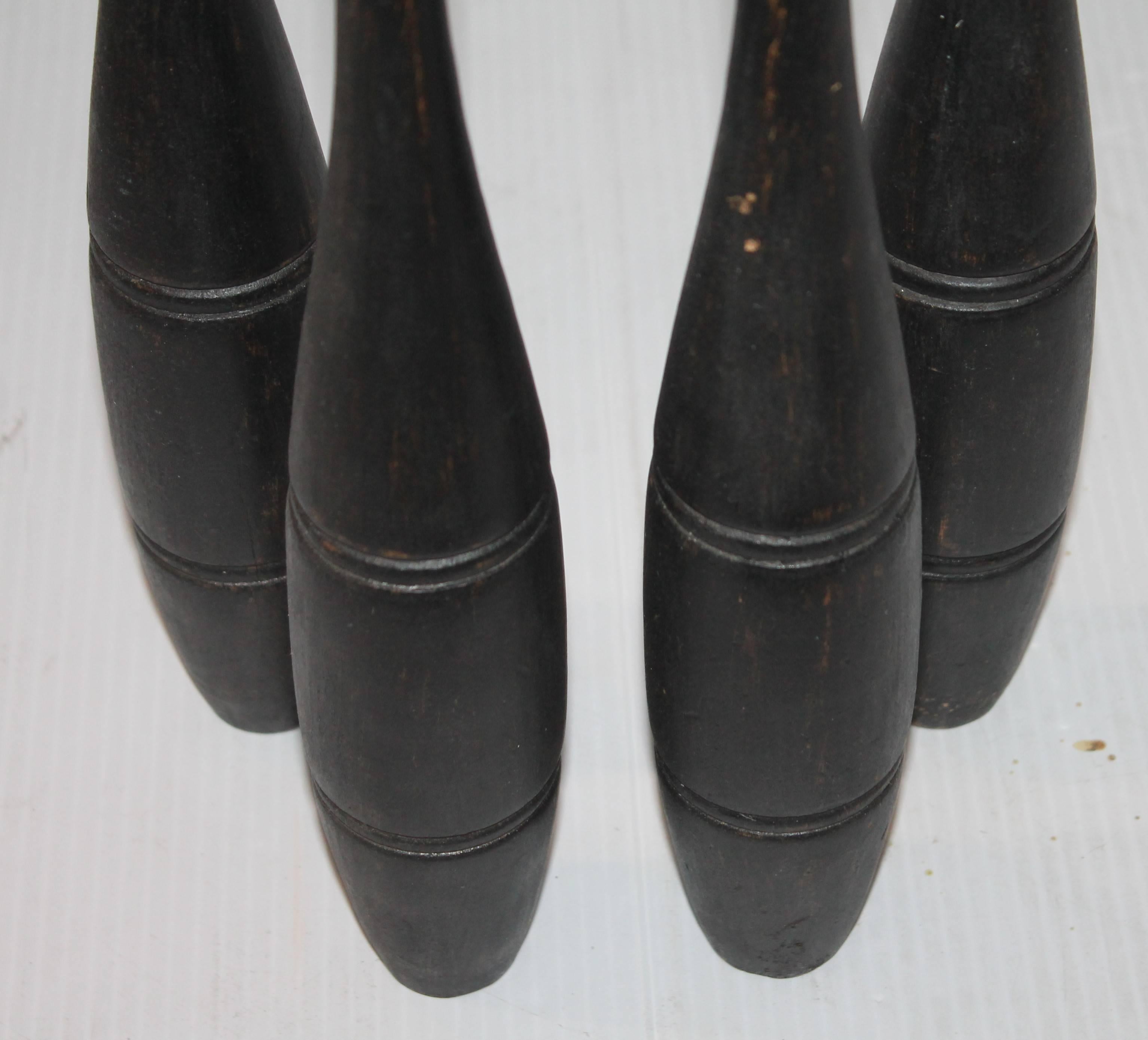 Folk Art Collection of Six 19th Century Black Painted Juggling Pins