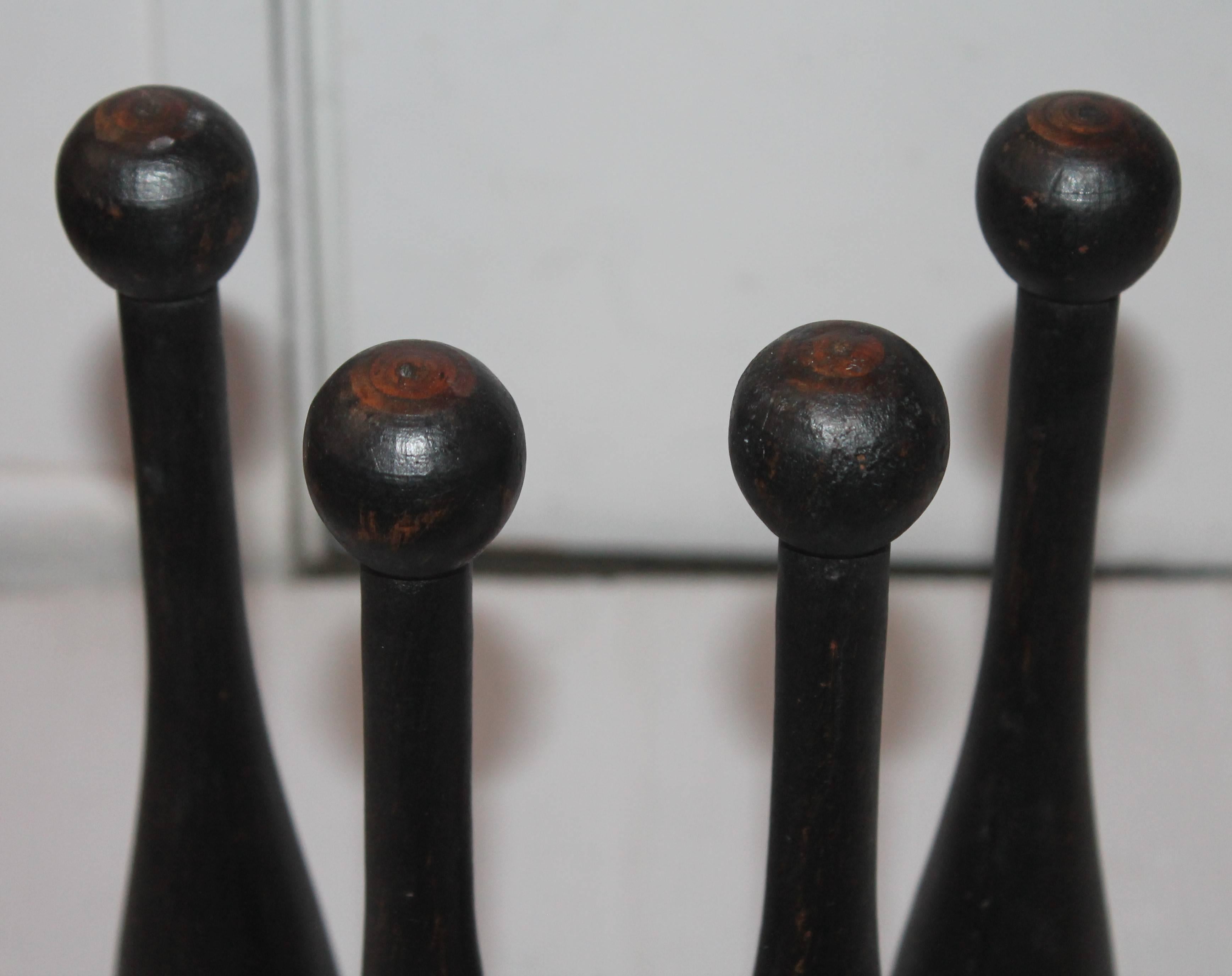 American Collection of Six 19th Century Black Painted Juggling Pins